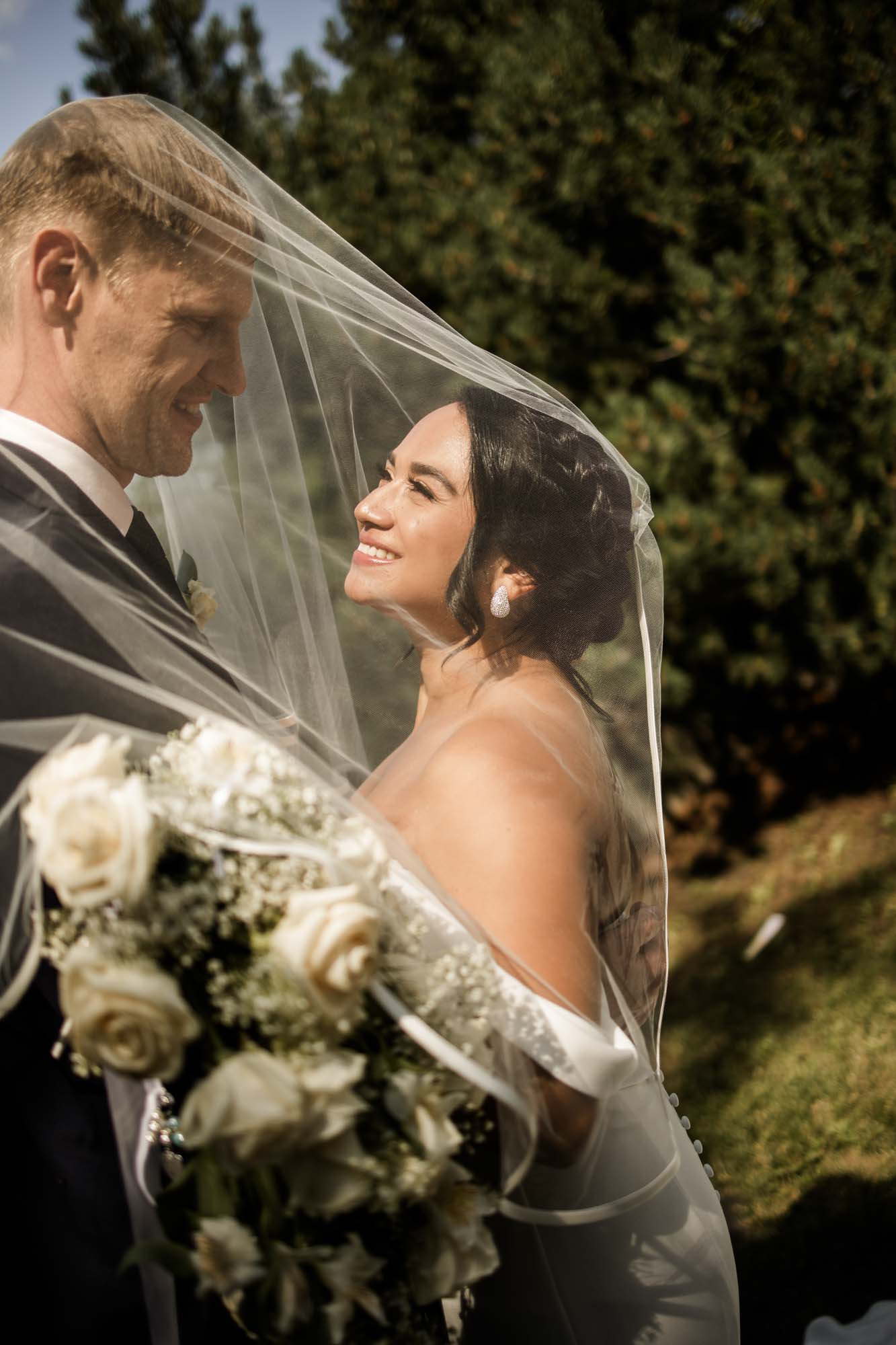 Calgary wedding photographer, wedding photography at the Lake House restaurant after a church ceremony and bridal portraits at Lake Bonavista. Photos captured in a candid, storytelling, documentary style