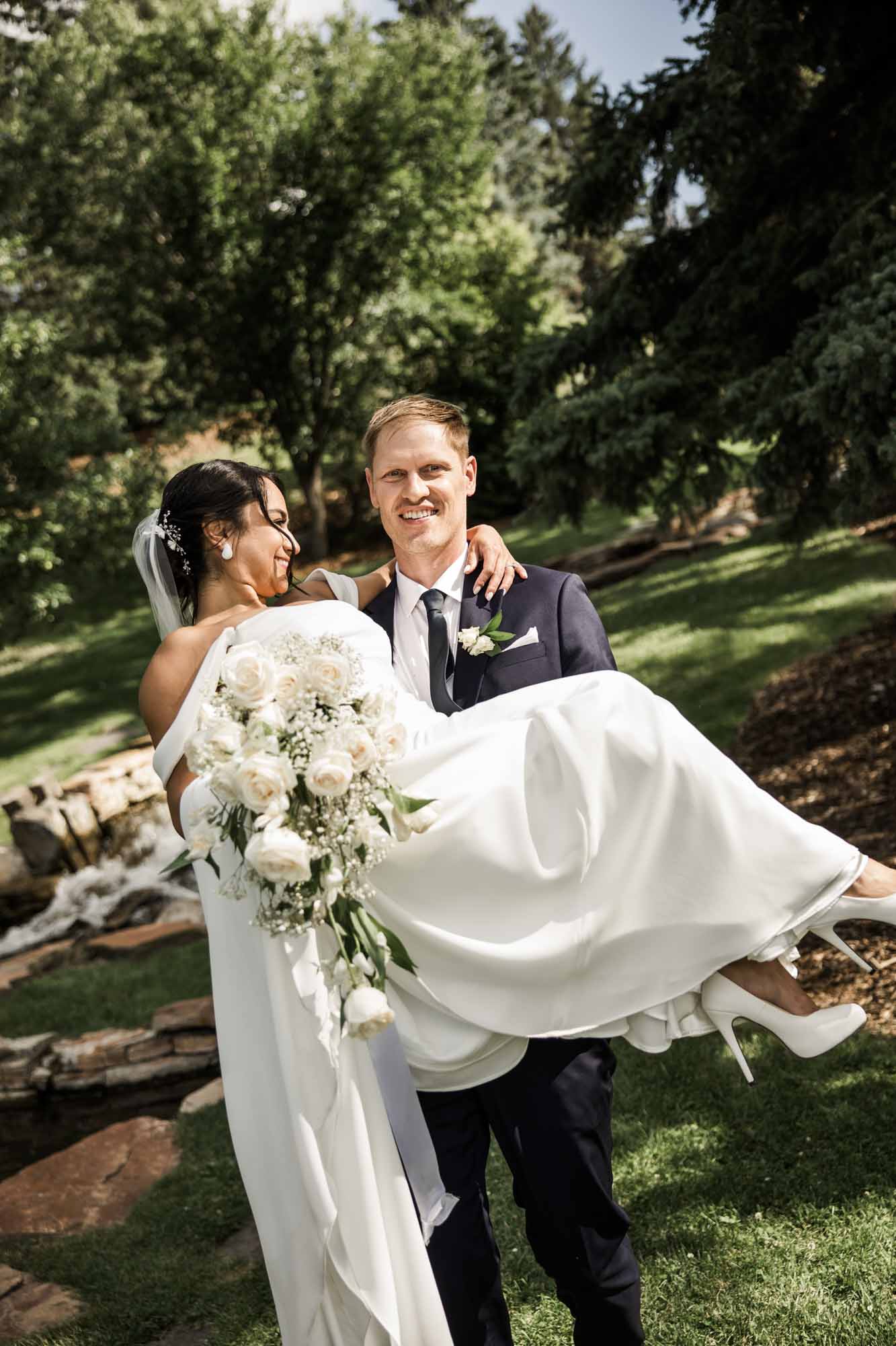 Calgary wedding photographer, wedding photography at the Lake House restaurant after a church ceremony and bridal portraits at Lake Bonavista. Photos captured in a candid, storytelling, documentary style