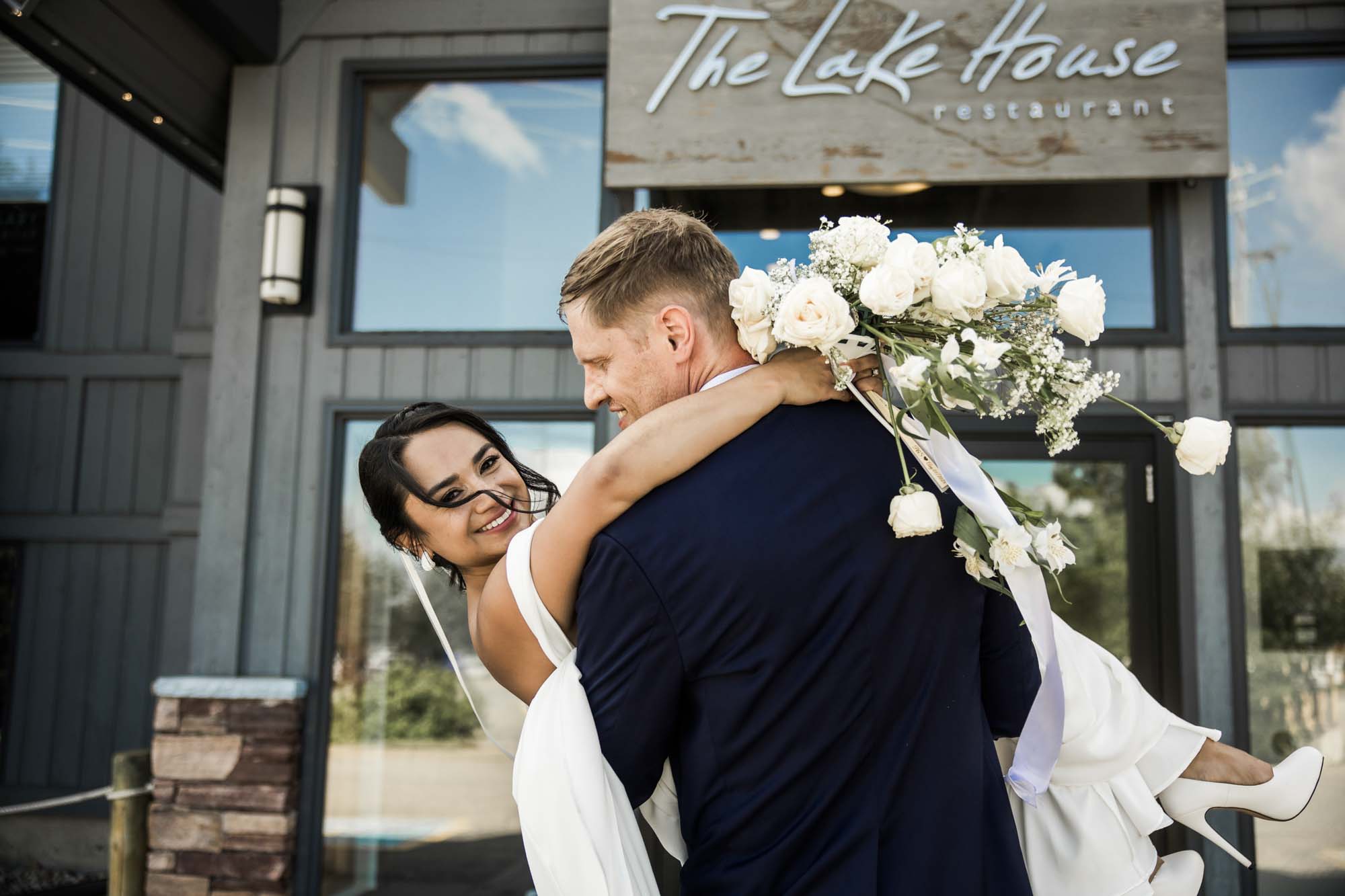 Calgary wedding photographer, wedding photography at the Lake House restaurant after a church ceremony and bridal portraits at Lake Bonavista. Photos captured in a candid, storytelling, documentary style