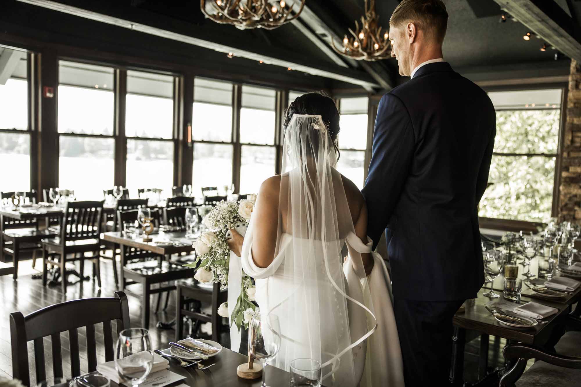 Calgary wedding photographer, wedding photography at the Lake House restaurant after a church ceremony and bridal portraits at Lake Bonavista. Photos captured in a candid, storytelling, documentary style