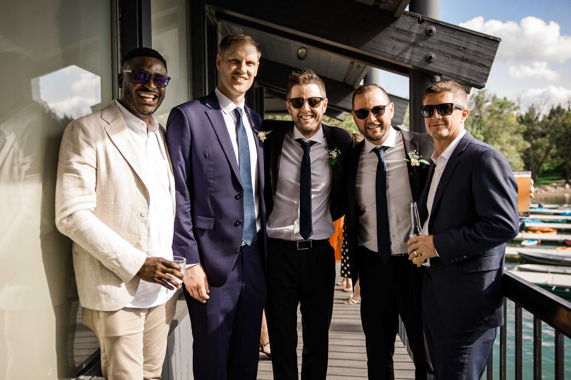 Calgary wedding photographer, wedding photography at the Lake House restaurant after a church ceremony and bridal portraits at Lake Bonavista. Photos captured in a candid, storytelling, documentary style