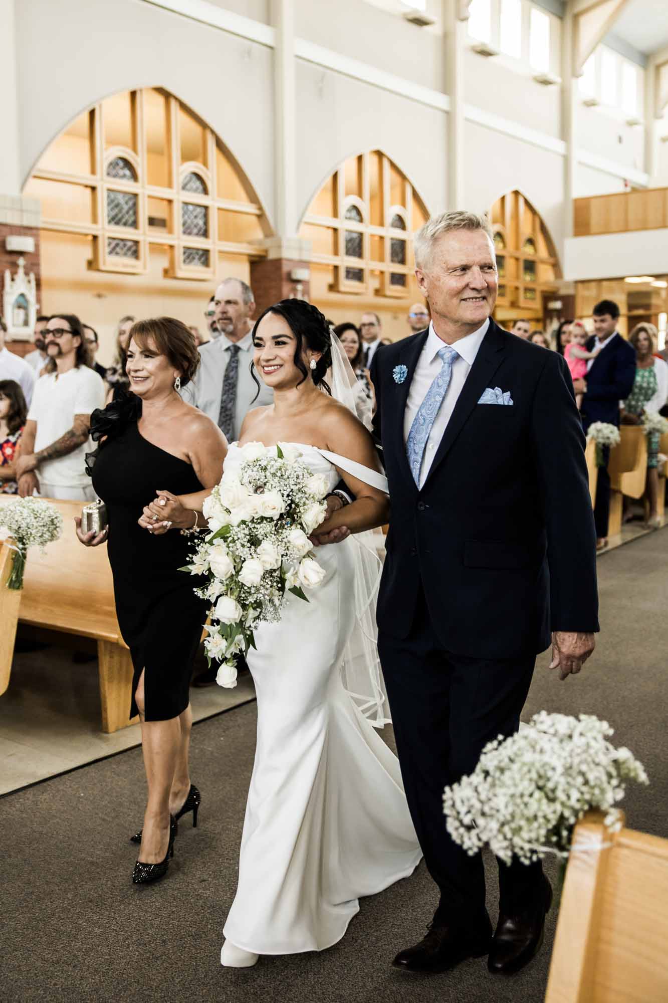 Calgary wedding photographer, wedding photography at the Lake House restaurant after a church ceremony and bridal portraits at Lake Bonavista. Photos captured in a candid, storytelling, documentary style