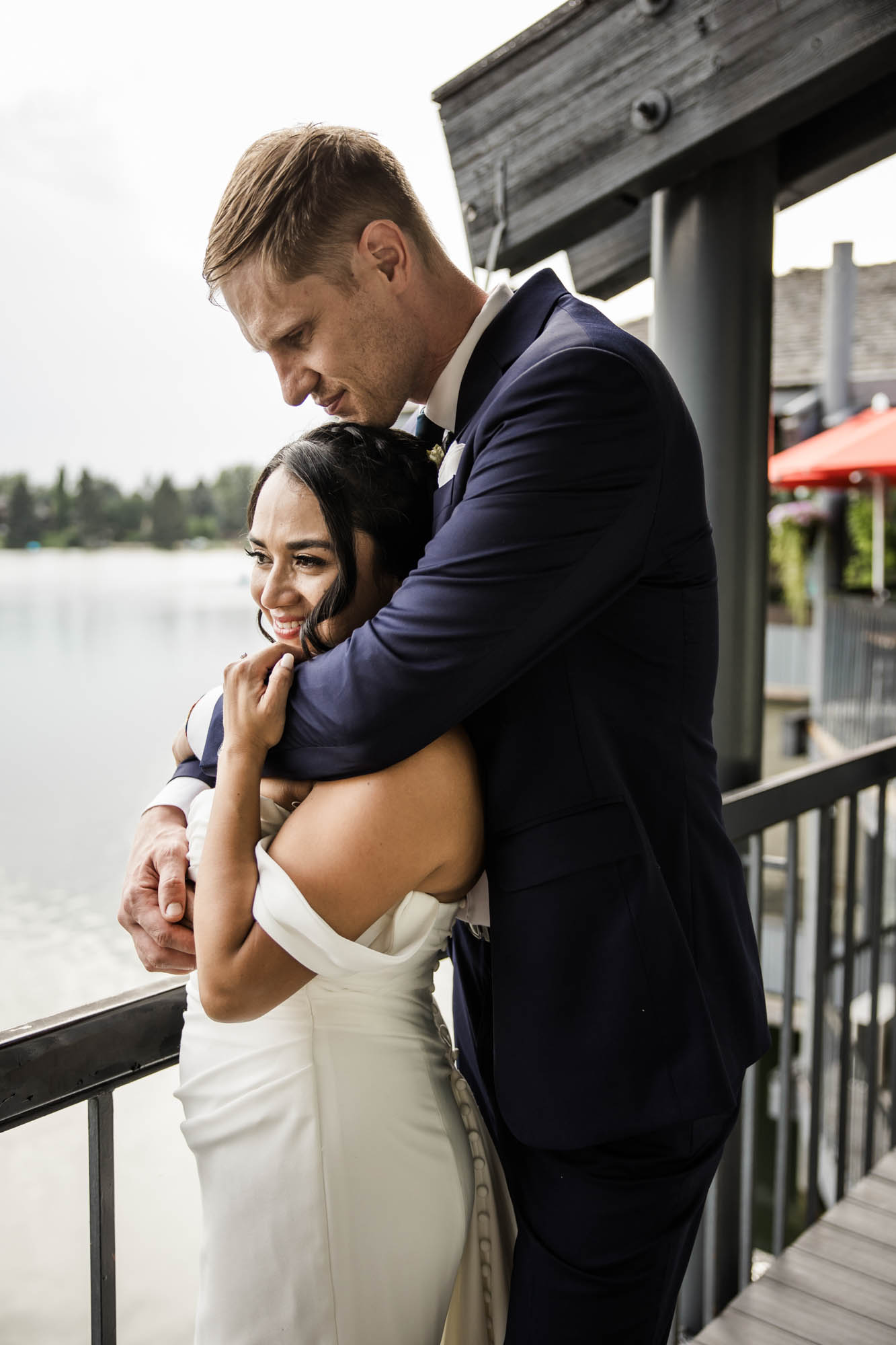 Calgary wedding photographer, wedding photography at the Lake House restaurant after a church ceremony and bridal portraits at Lake Bonavista. Photos captured in a candid, storytelling, documentary style