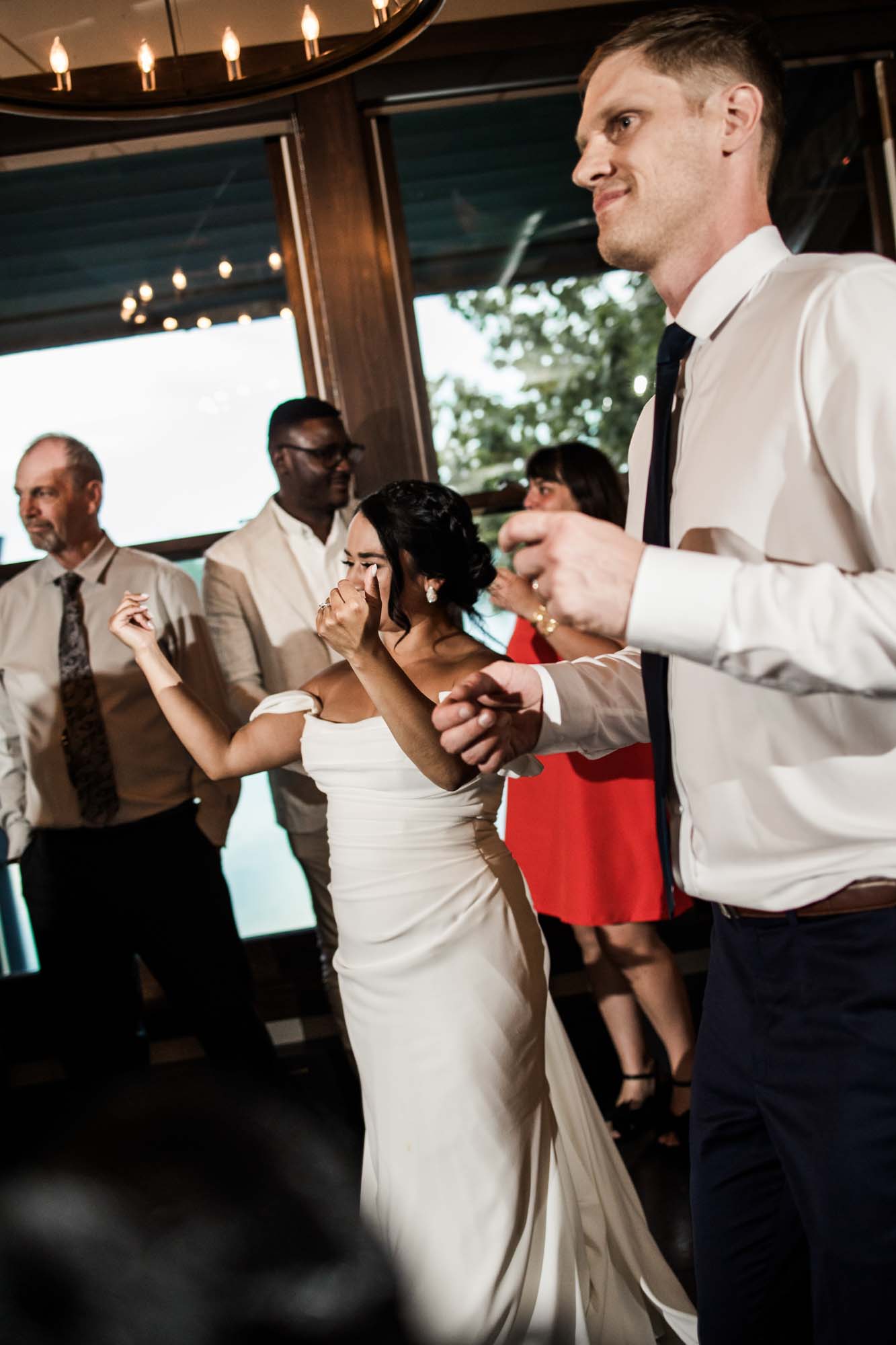 Calgary wedding photographer, wedding photography at the Lake House restaurant after a church ceremony and bridal portraits at Lake Bonavista. Photos captured in a candid, storytelling, documentary style