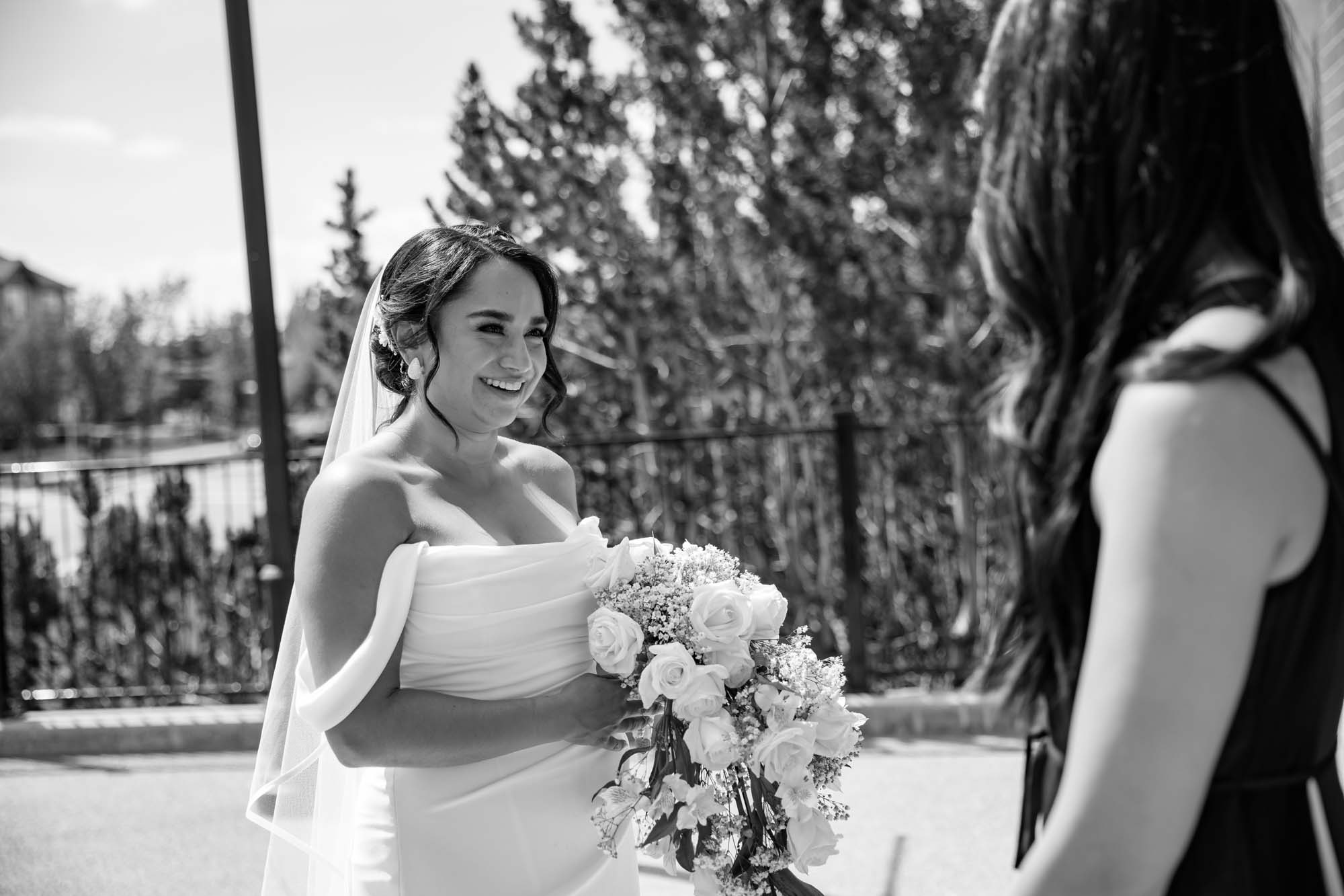 Calgary wedding photographer, wedding photography at the Lake House restaurant after a church ceremony and bridal portraits at Lake Bonavista. Photos captured in a candid, storytelling, documentary style