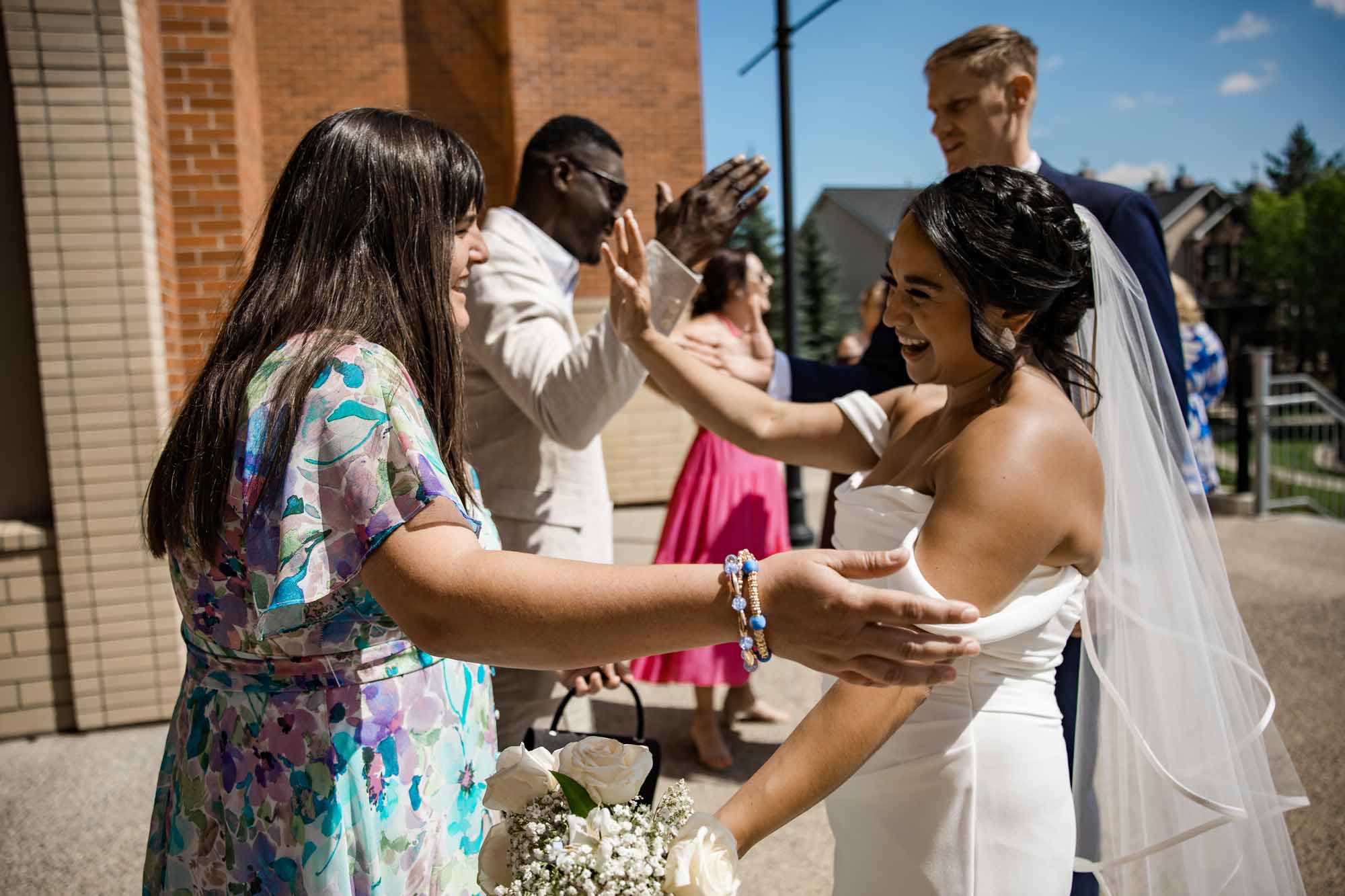 Calgary wedding photographer, wedding photography at the Lake House restaurant after a church ceremony and bridal portraits at Lake Bonavista. Photos captured in a candid, storytelling, documentary style