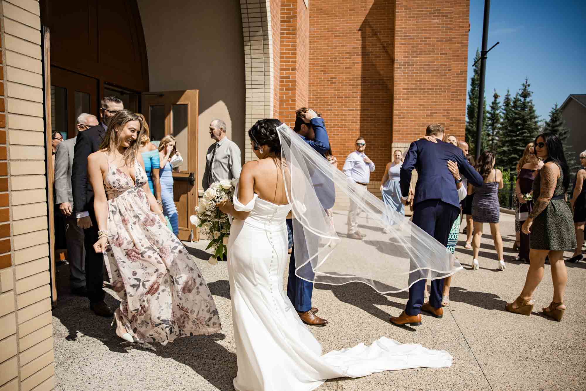 Calgary wedding photographer, wedding photography at the Lake House restaurant after a church ceremony and bridal portraits at Lake Bonavista. Photos captured in a candid, storytelling, documentary style