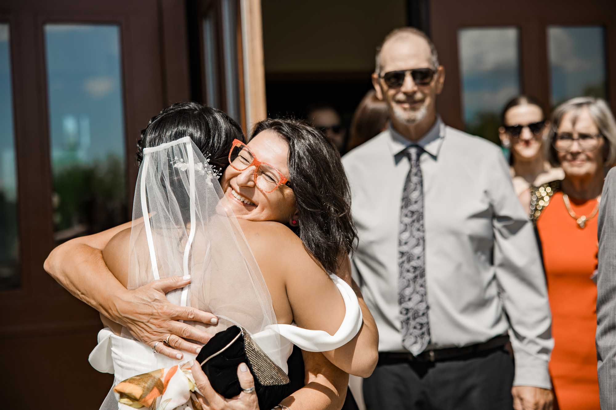 Calgary wedding photographer, wedding photography at the Lake House restaurant after a church ceremony and bridal portraits at Lake Bonavista. Photos captured in a candid, storytelling, documentary style