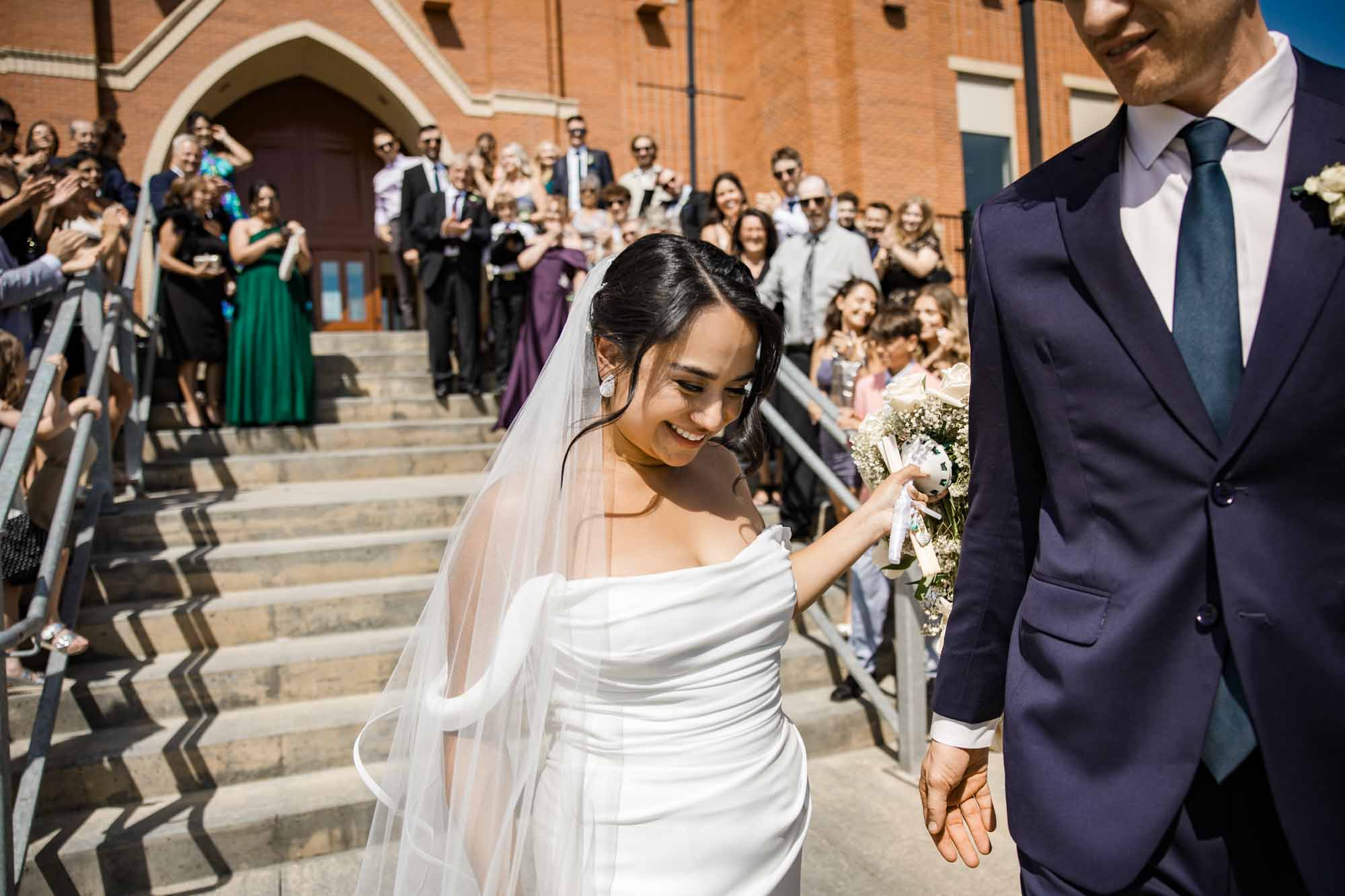Calgary wedding photographer, wedding photography at the Lake House restaurant after a church ceremony and bridal portraits at Lake Bonavista. Photos captured in a candid, storytelling, documentary style