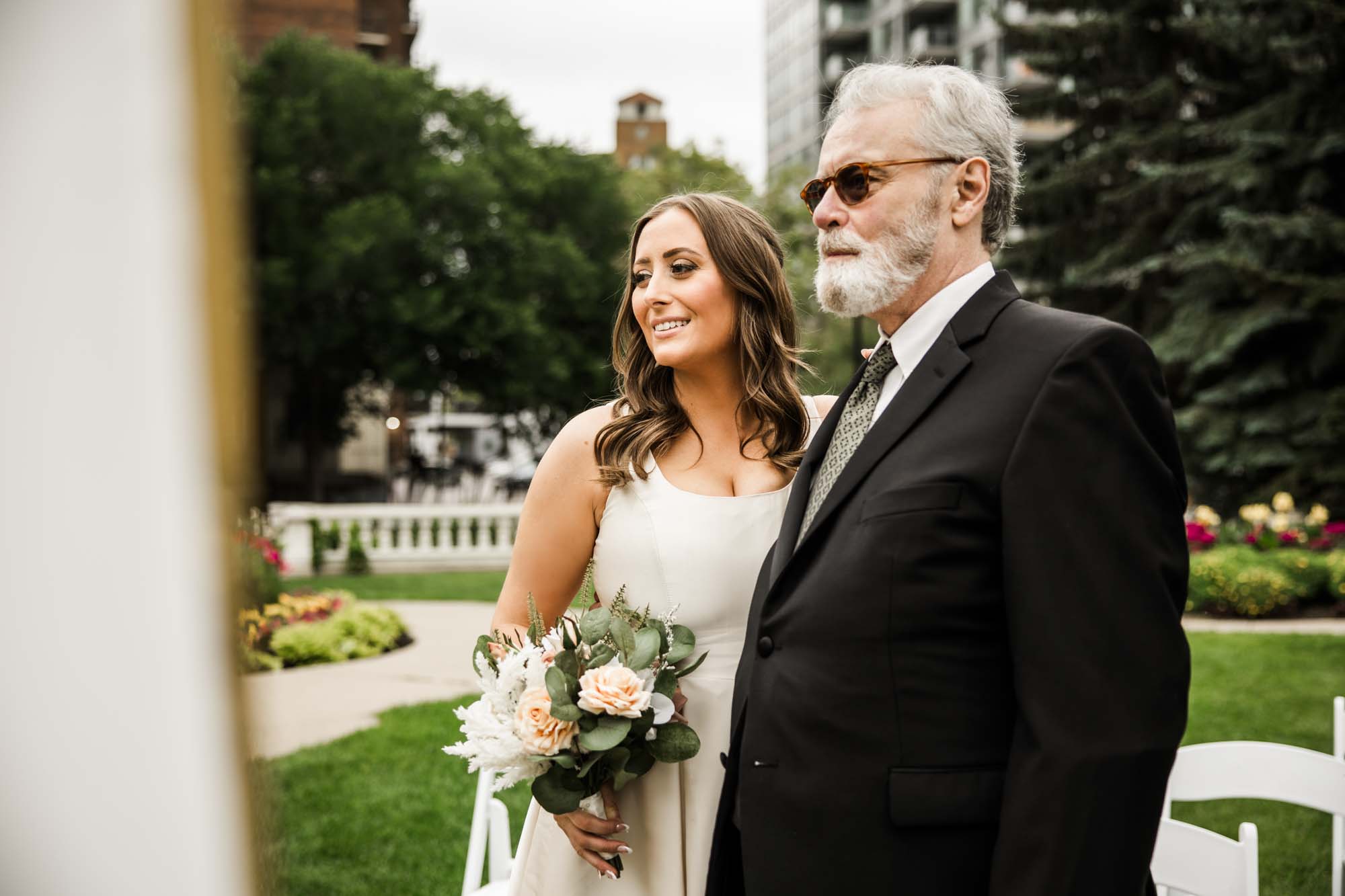 Calgary wedding photographer, couple on their wedding day at Lougheed House, photography in an editorial style with vintage bridal attire and venue