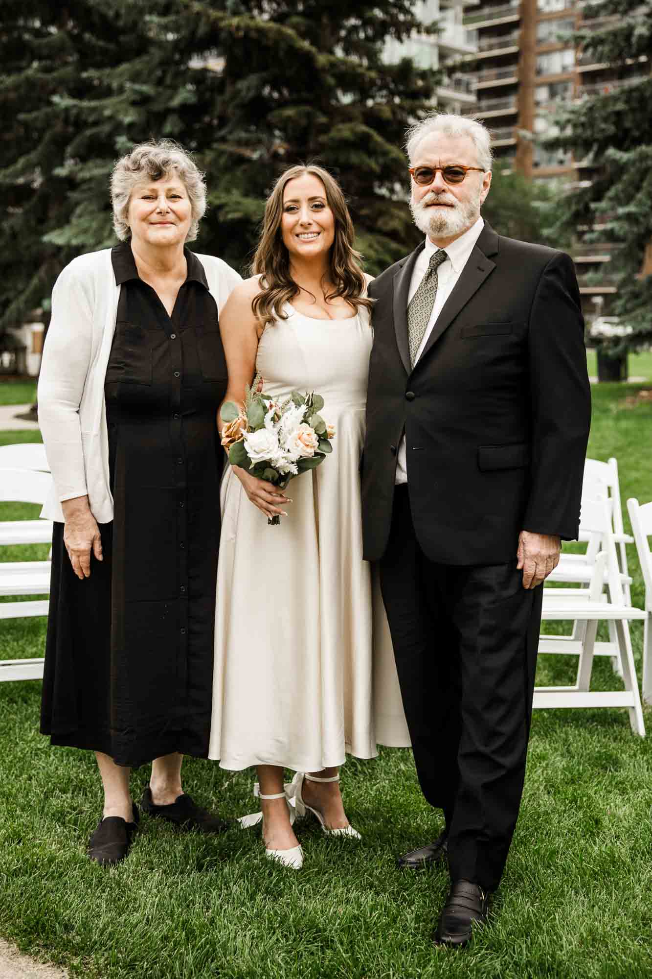 Calgary wedding photographer, couple on their wedding day at Lougheed House, photography in an editorial style with vintage bridal attire and venue
