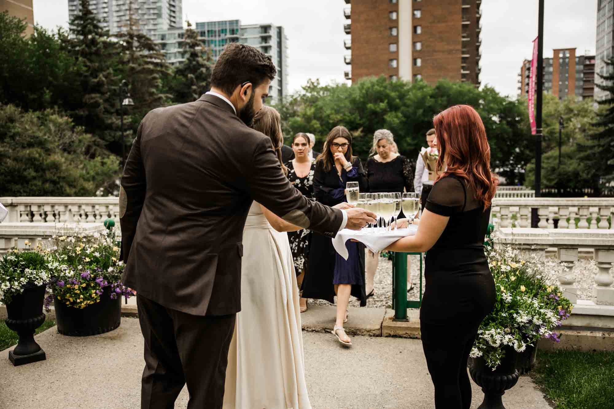 Calgary wedding photographer, couple on their wedding day at Lougheed House, photography in an editorial style with vintage bridal attire and venue