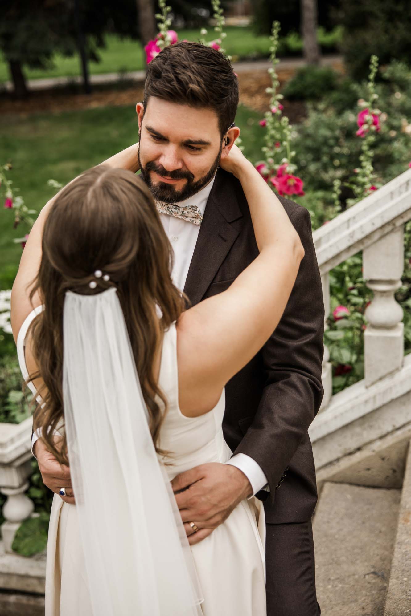 Calgary wedding photographer, couple on their wedding day at Lougheed House, photography in an editorial style with vintage bridal attire and venue