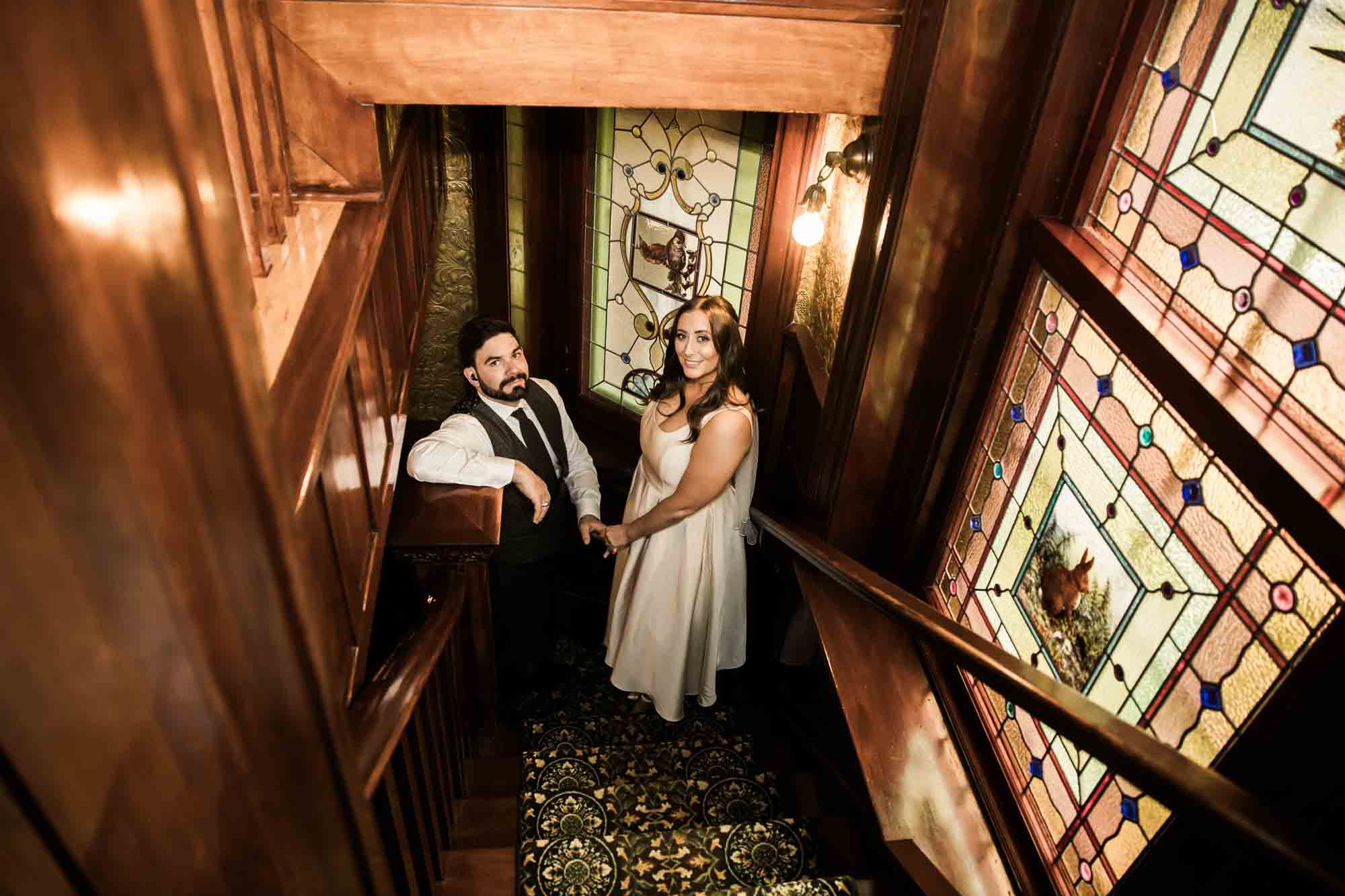 Calgary wedding photographer, couple on their wedding day at Lougheed House, photography in an editorial style with vintage bridal attire and venue