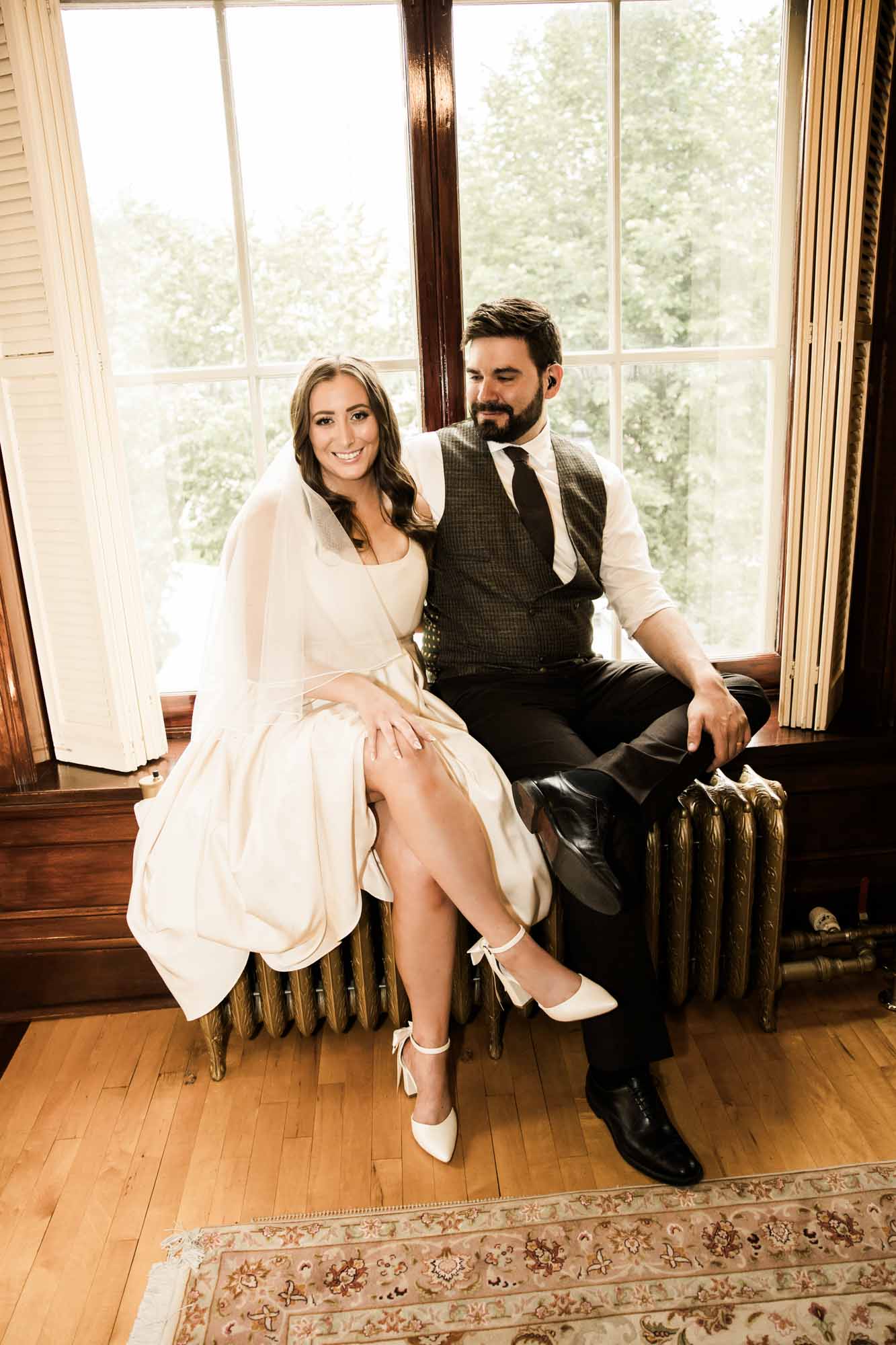Calgary wedding photographer, couple on their wedding day at Lougheed House, photography in an editorial style with vintage bridal attire and venue