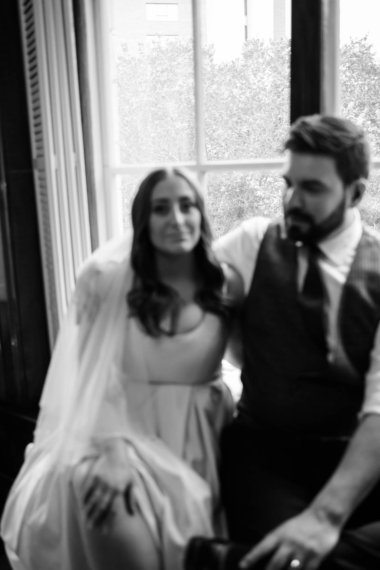 Calgary wedding photographer, couple on their wedding day at Lougheed House, photography in an editorial style with vintage bridal attire and venue