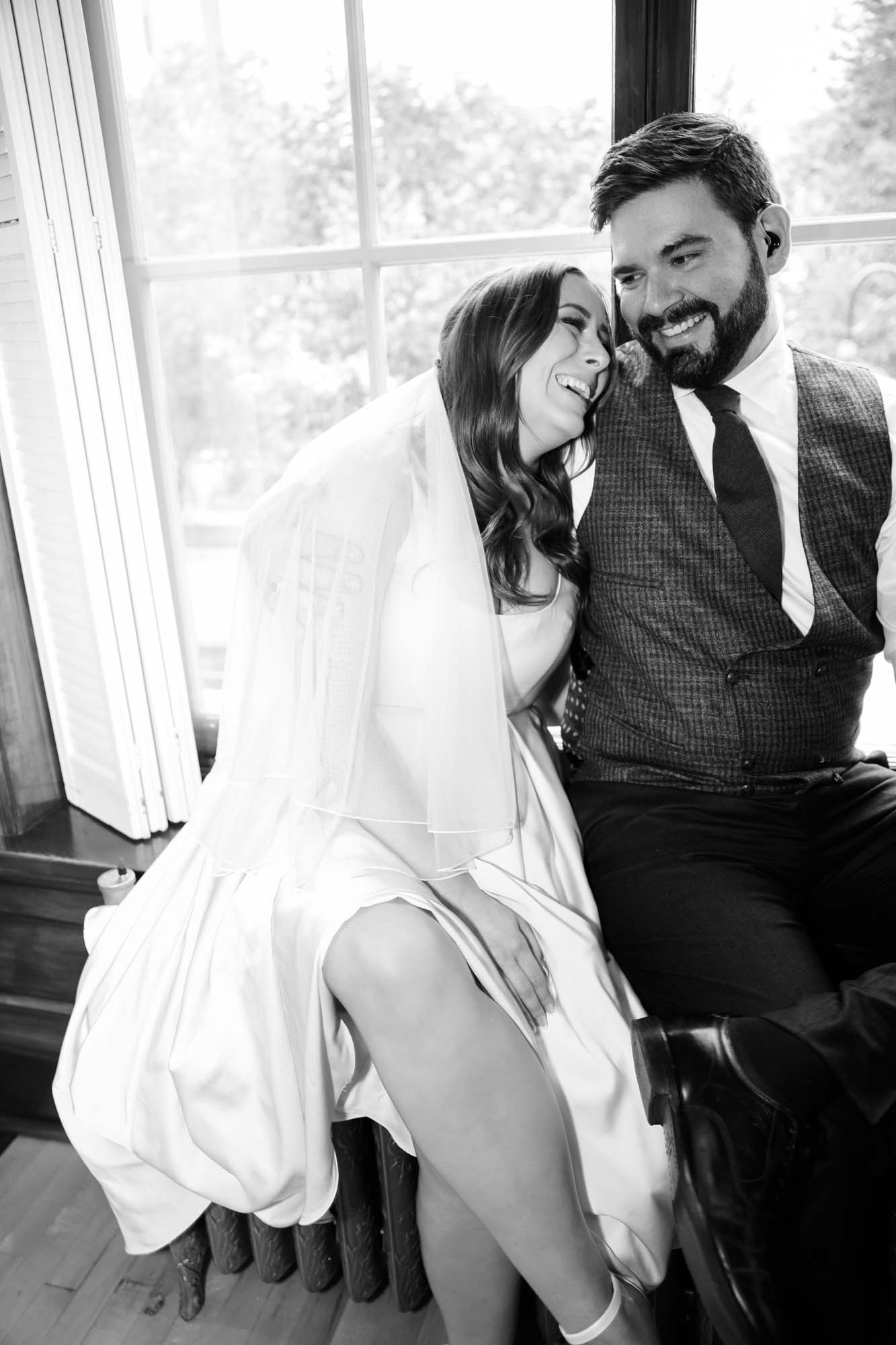 Calgary wedding photographer, couple on their wedding day at Lougheed House, photography in an editorial style with vintage bridal attire and venue