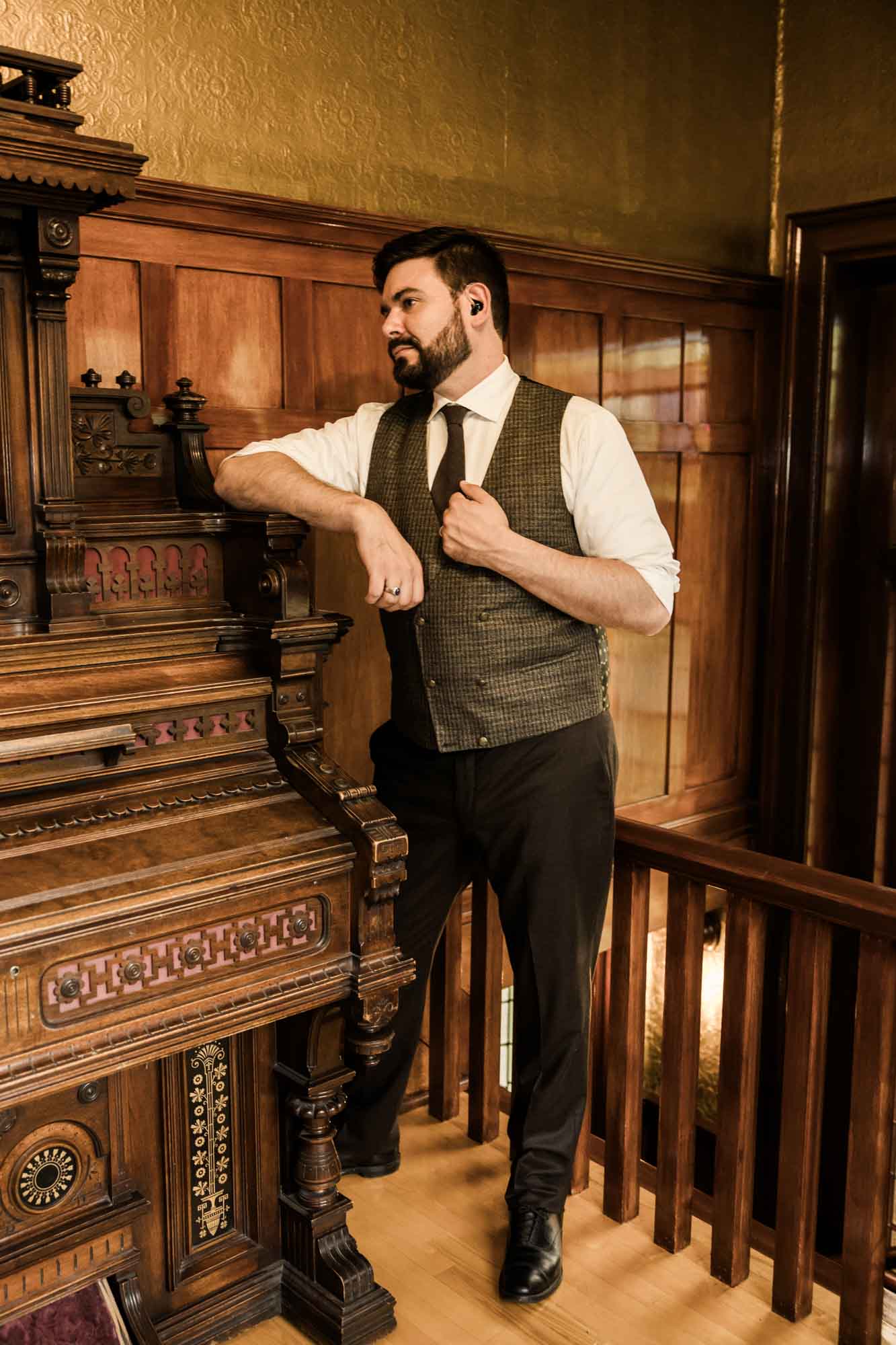 Calgary wedding photographer, couple on their wedding day at Lougheed House, photography in an editorial style with vintage bridal attire and venue