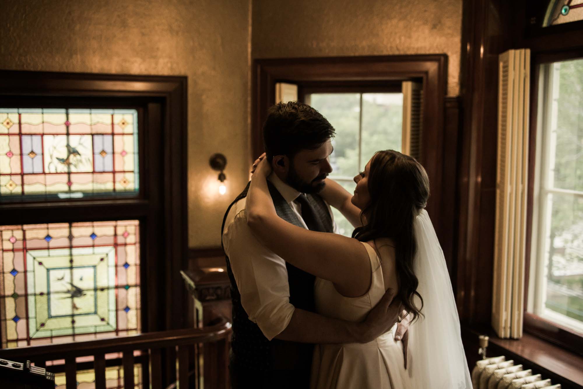 Calgary wedding photographer, couple on their wedding day at Lougheed House, photography in an editorial style with vintage bridal attire and venue