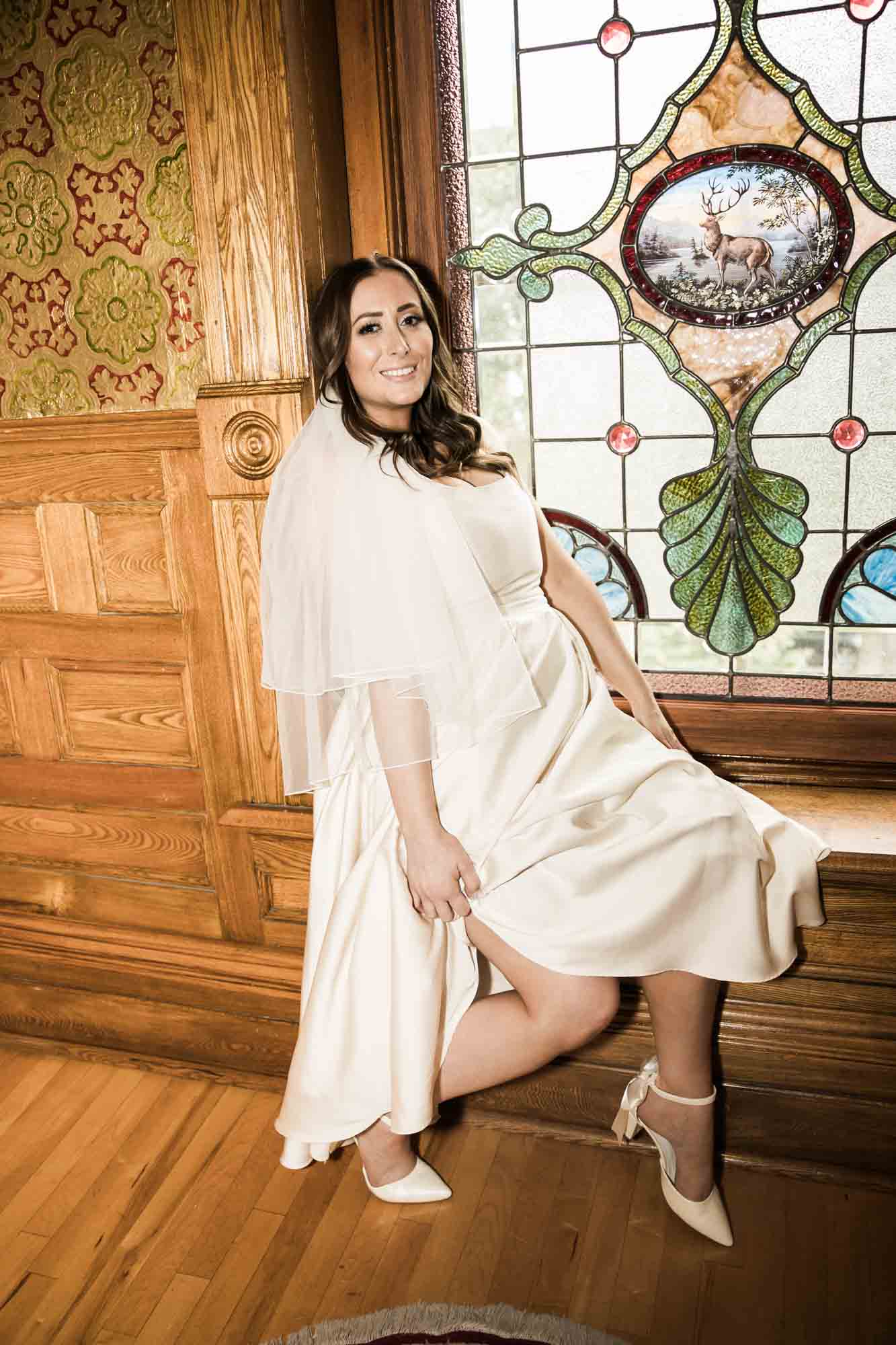 Calgary wedding photographer, couple on their wedding day at Lougheed House, photography in an editorial style with vintage bridal attire and venue