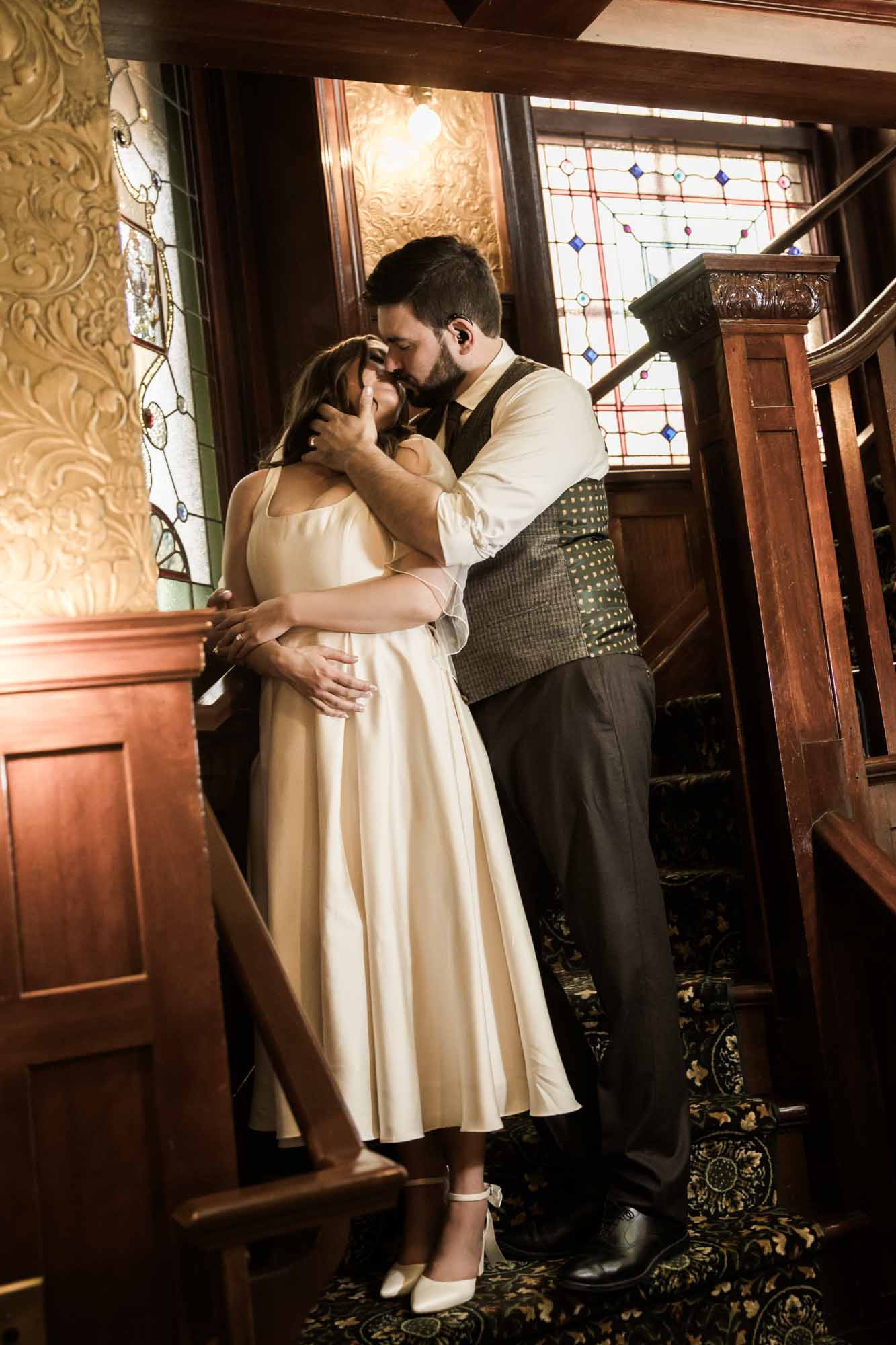 Calgary wedding photographer, couple on their wedding day at Lougheed House, photography in an editorial style with vintage bridal attire and venue