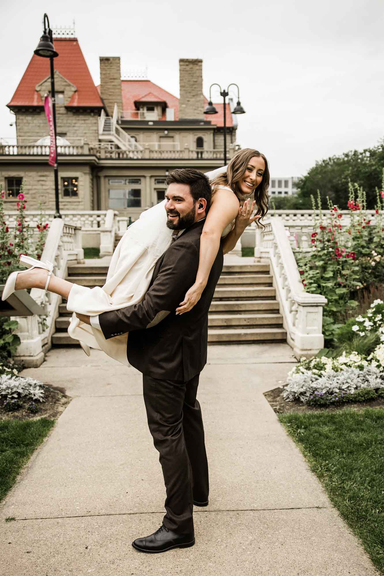 Calgary wedding photographer, couple on their wedding day at Lougheed House, photography in an editorial style with vintage bridal attire and venue