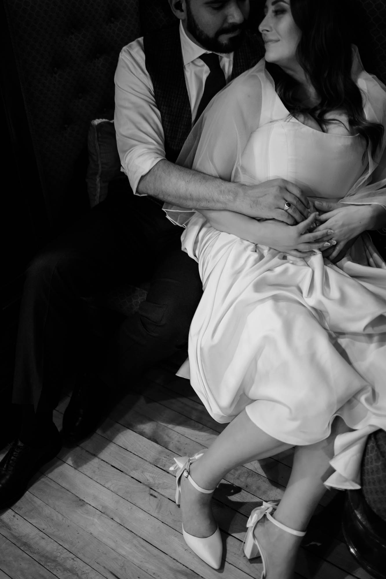 Calgary wedding photographer, couple on their wedding day at Lougheed House, photography in an editorial style with vintage bridal attire and venue