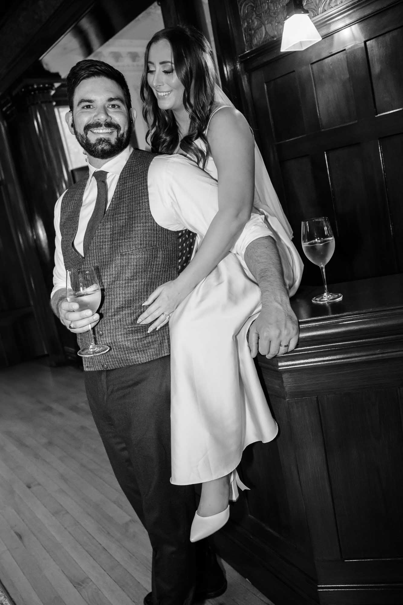 Calgary wedding photographer, couple on their wedding day at Lougheed House, photography in an editorial style with vintage bridal attire and venue