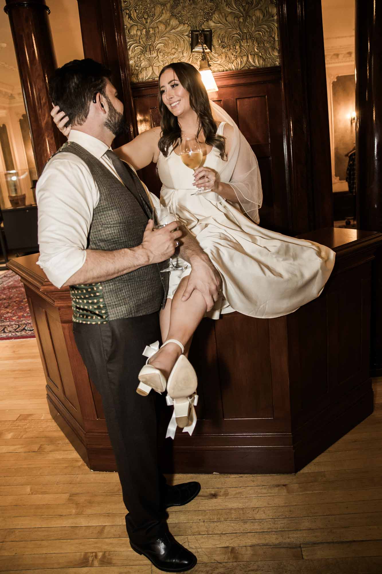 Calgary wedding photographer, couple on their wedding day at Lougheed House, photography in an editorial style with vintage bridal attire and venue