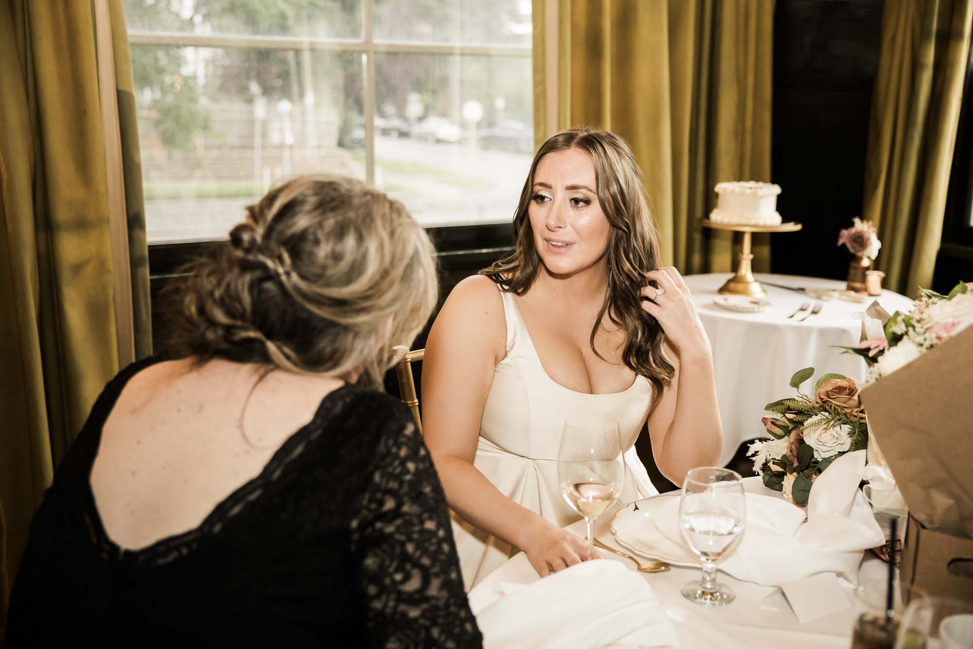 Calgary wedding photographer, couple on their wedding day at Lougheed House, photography in an editorial style with vintage bridal attire and venue