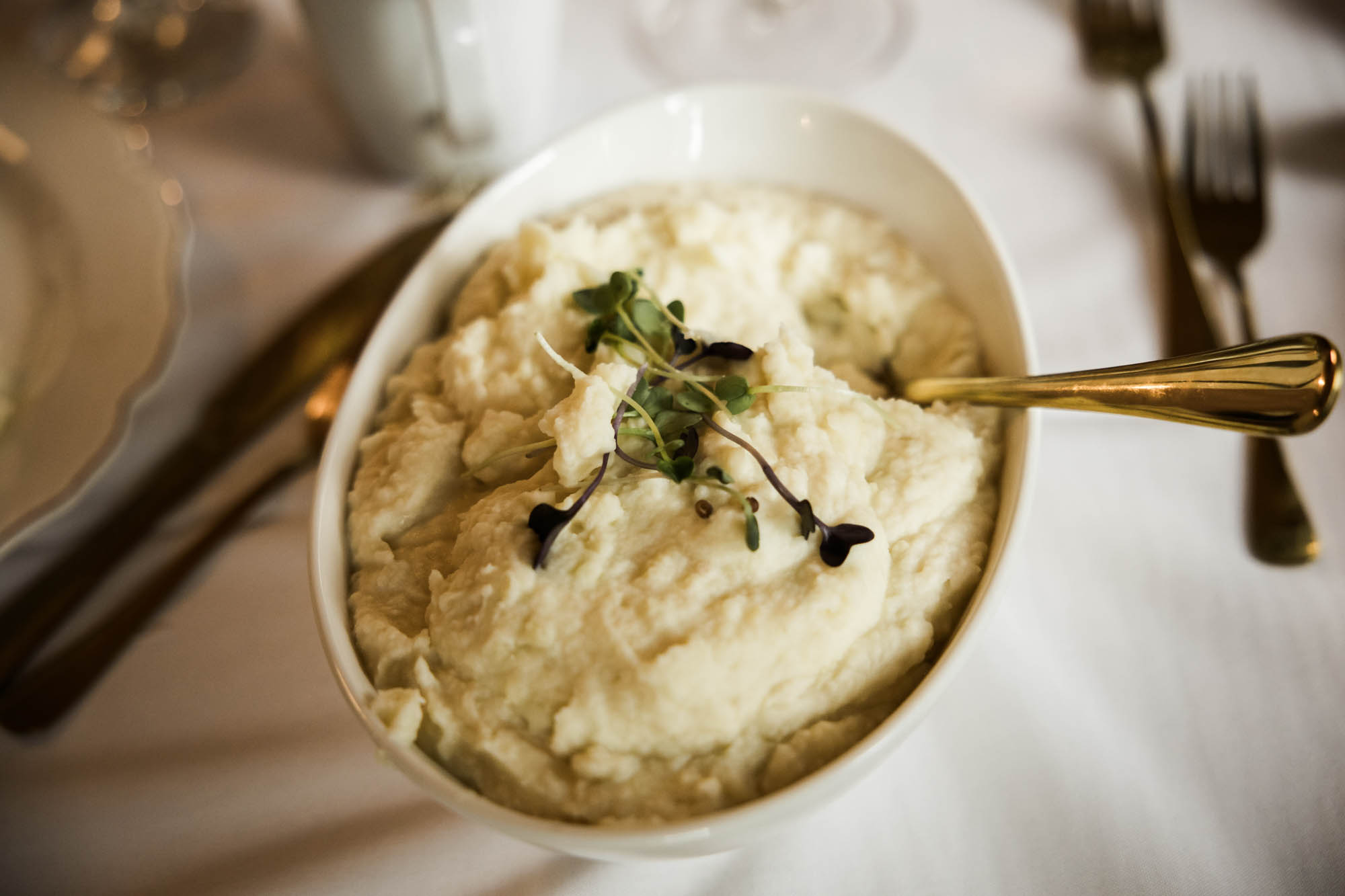 Calgary wedding photographer, couple on their wedding day at Lougheed House, photography in an editorial style with vintage bridal attire and venue