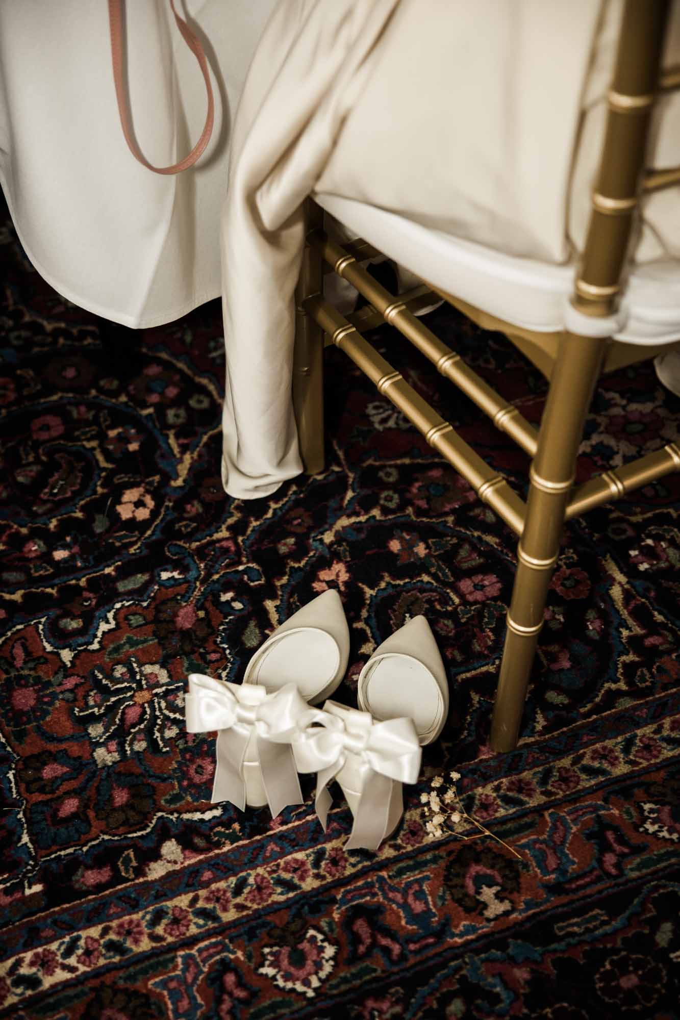 Calgary wedding photographer, couple on their wedding day at Lougheed House, photography in an editorial style with vintage bridal attire and venue