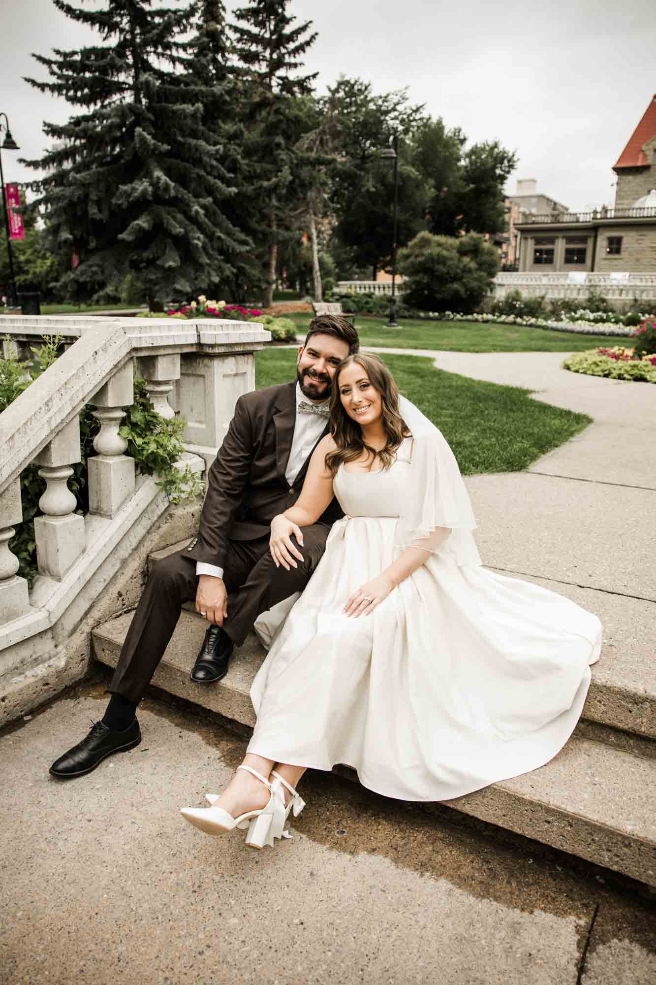 Calgary wedding photographer, couple on their wedding day at Lougheed House, photography in an editorial style with vintage bridal attire and venue