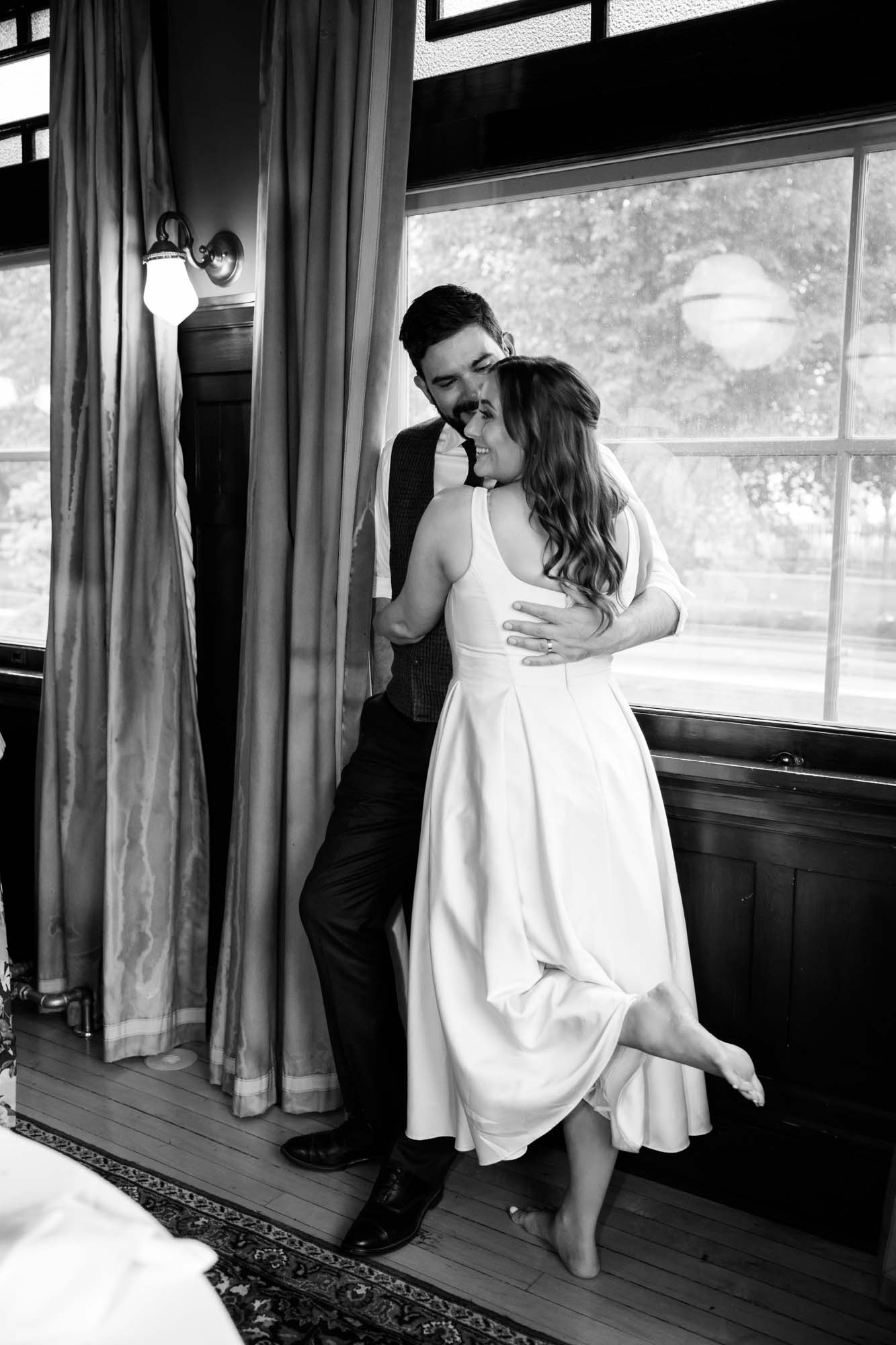 Calgary wedding photographer, couple on their wedding day at Lougheed House, photography in an editorial style with vintage bridal attire and venue