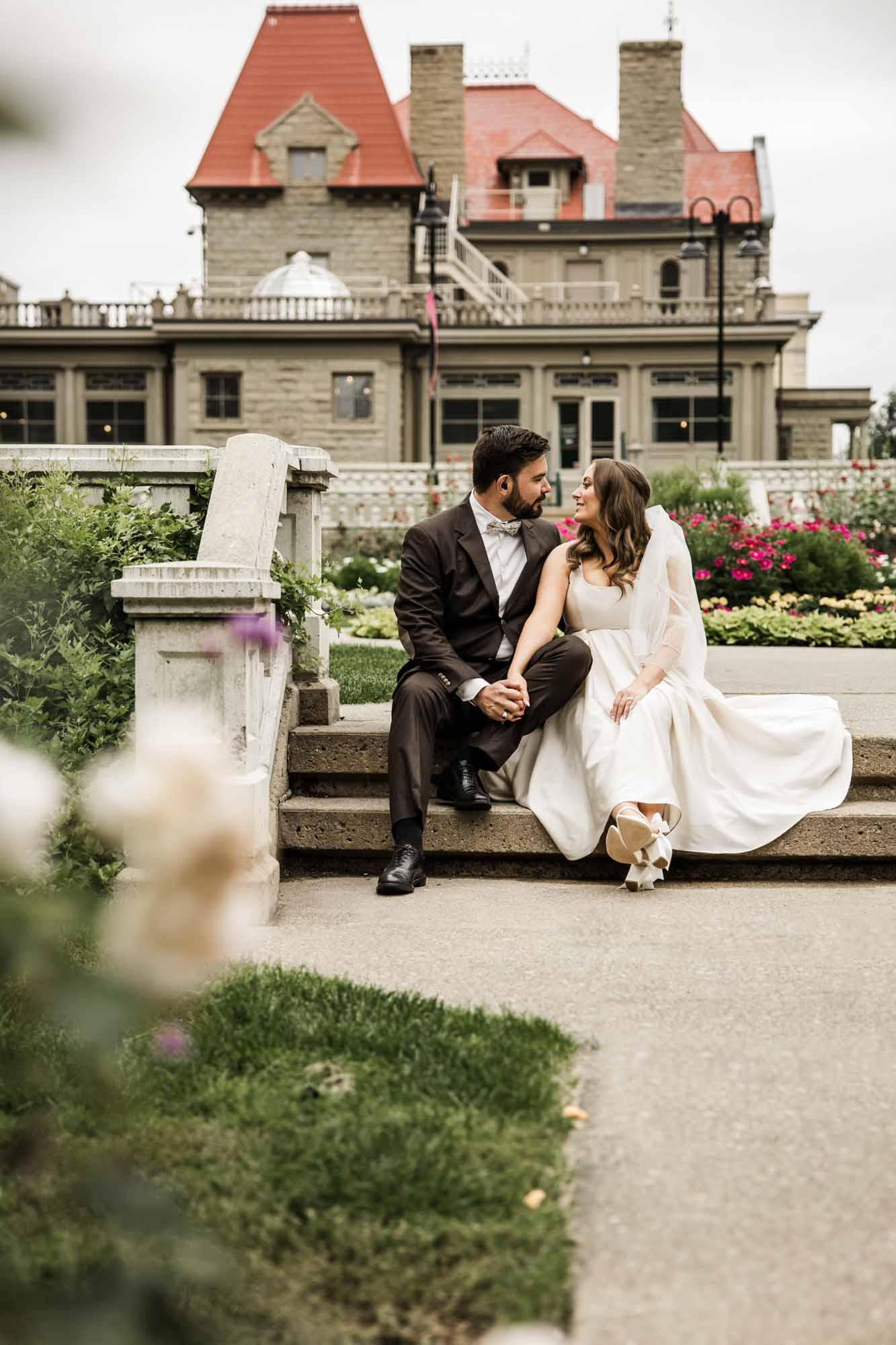 Calgary wedding photographer, couple on their wedding day at Lougheed House, photography in an editorial style with vintage bridal attire and venue