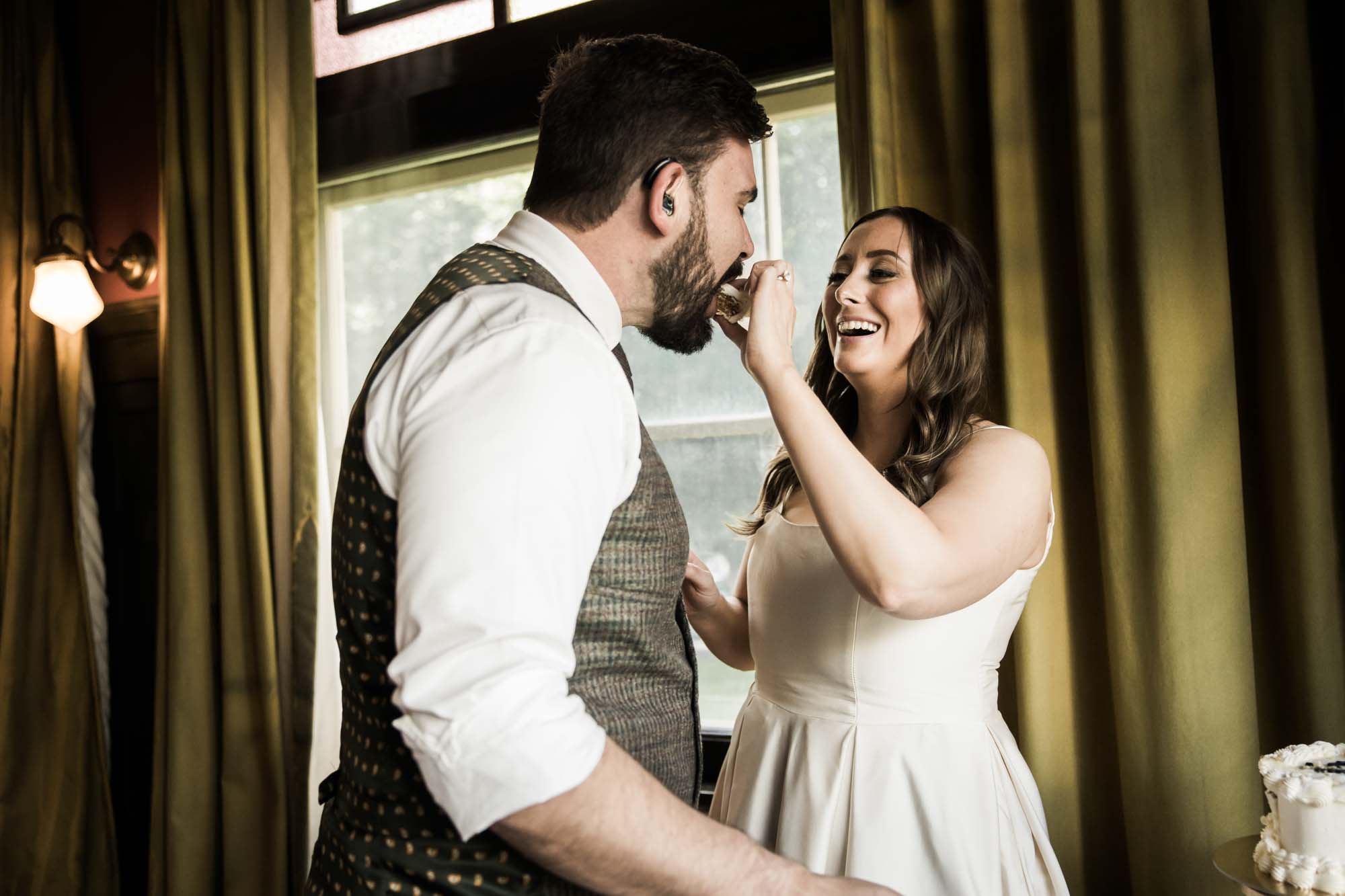 Calgary wedding photographer, couple on their wedding day at Lougheed House, photography in an editorial style with vintage bridal attire and venue