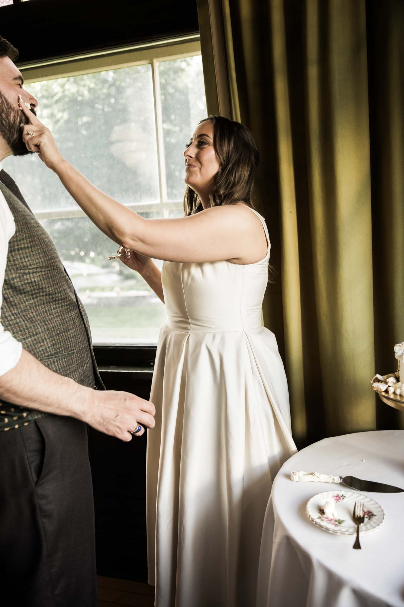 Calgary wedding photographer, couple on their wedding day at Lougheed House, photography in an editorial style with vintage bridal attire and venue