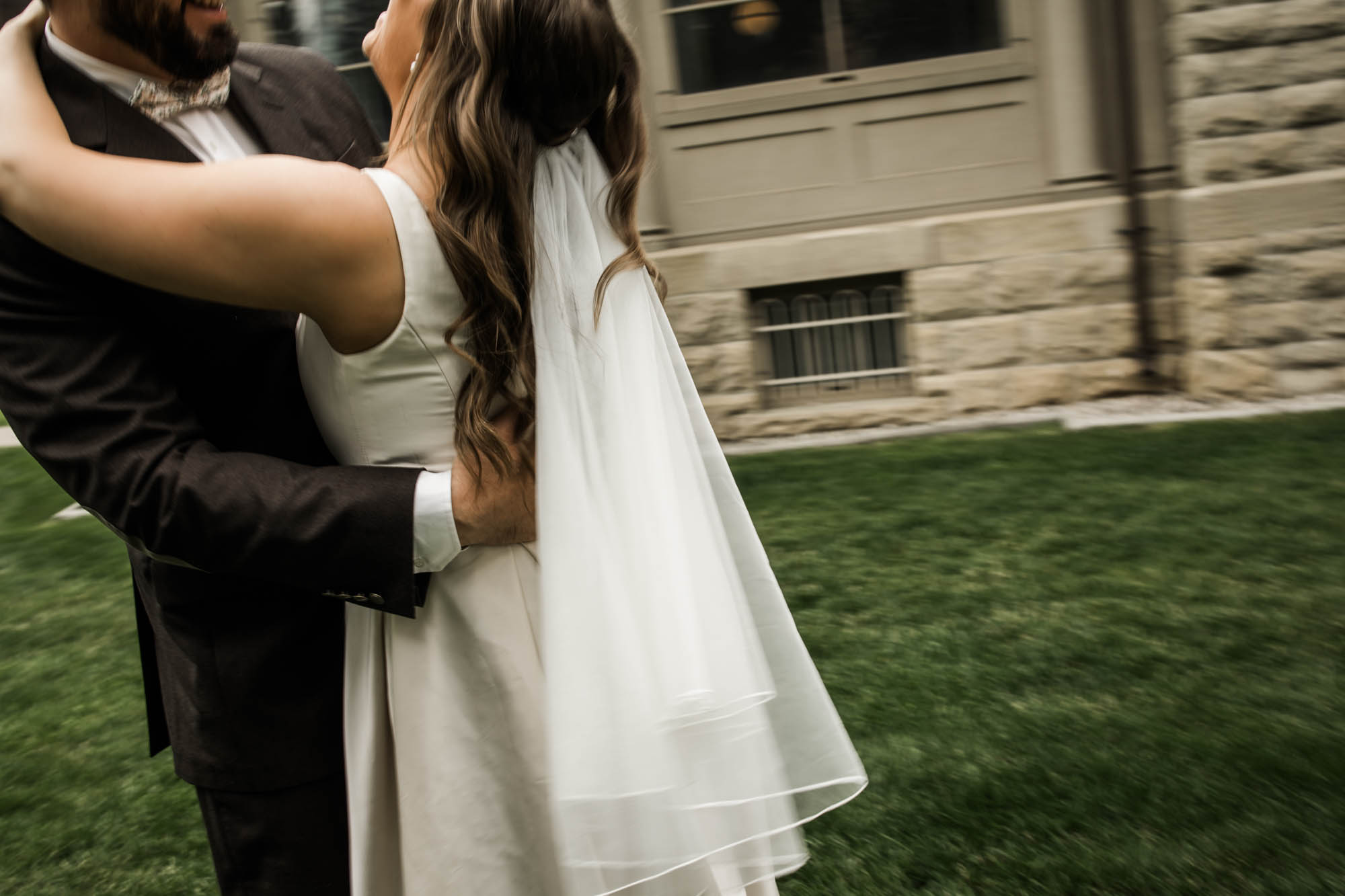 Calgary wedding photographer, couple on their wedding day at Lougheed House, photography in an editorial style with vintage bridal attire and venue