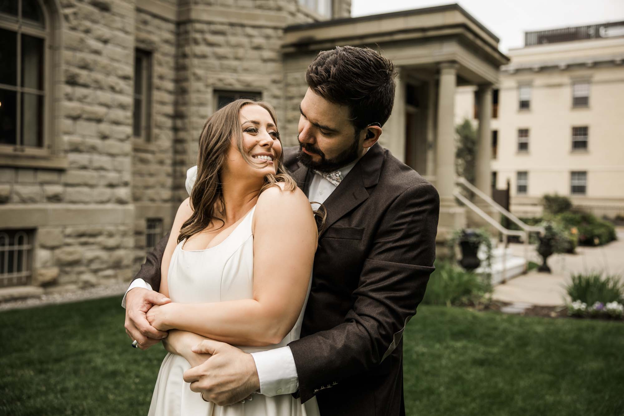 Calgary wedding photographer, couple on their wedding day at Lougheed House, photography in an editorial style with vintage bridal attire and venue