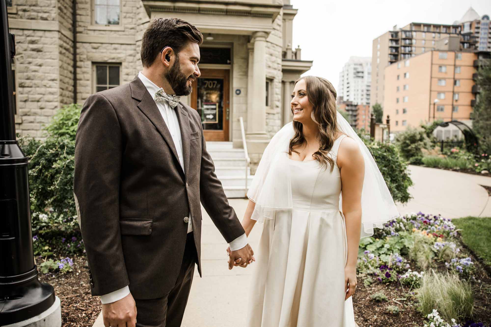 Calgary wedding photographer, couple on their wedding day at Lougheed House, photography in an editorial style with vintage bridal attire and venue