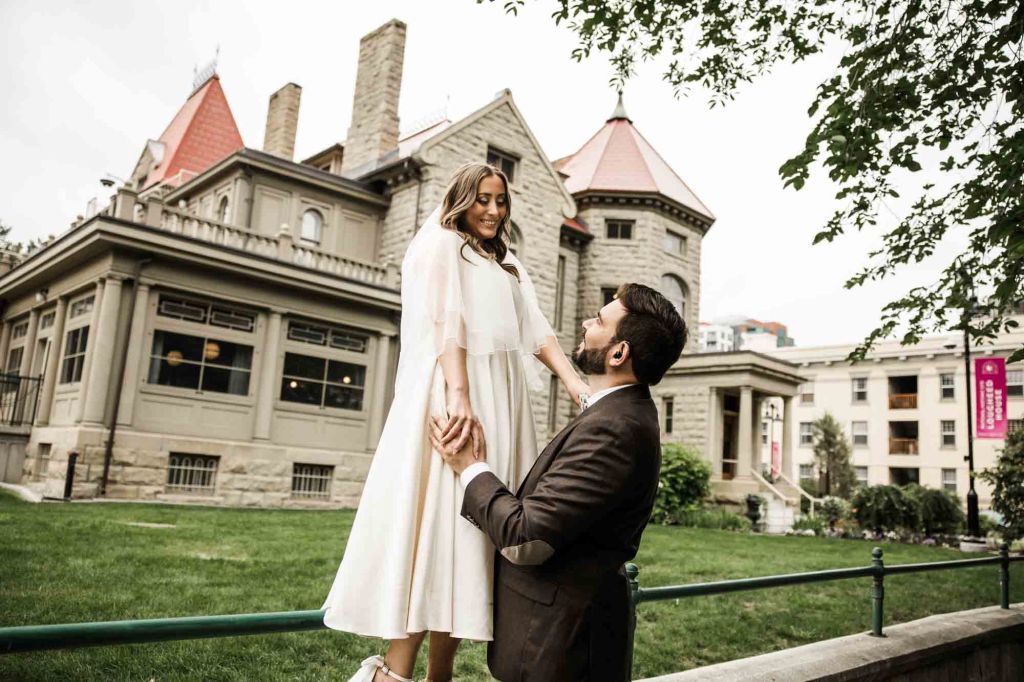Calgary wedding photographer, couple on their wedding day at Lougheed House, photography in an editorial style with vintage bridal attire and venue