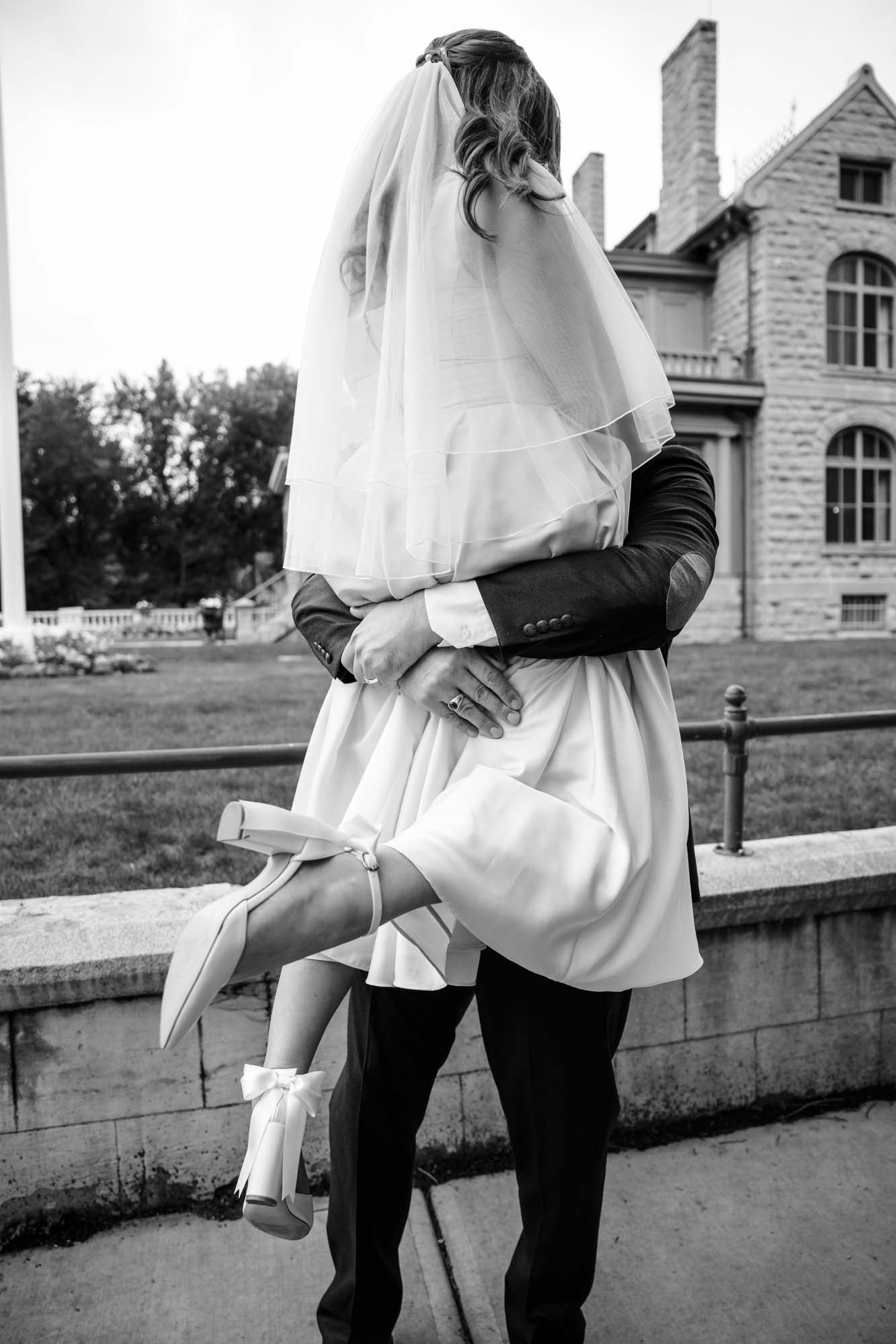 Calgary wedding photographer, couple on their wedding day at Lougheed House, photography in an editorial style with vintage bridal attire and venue