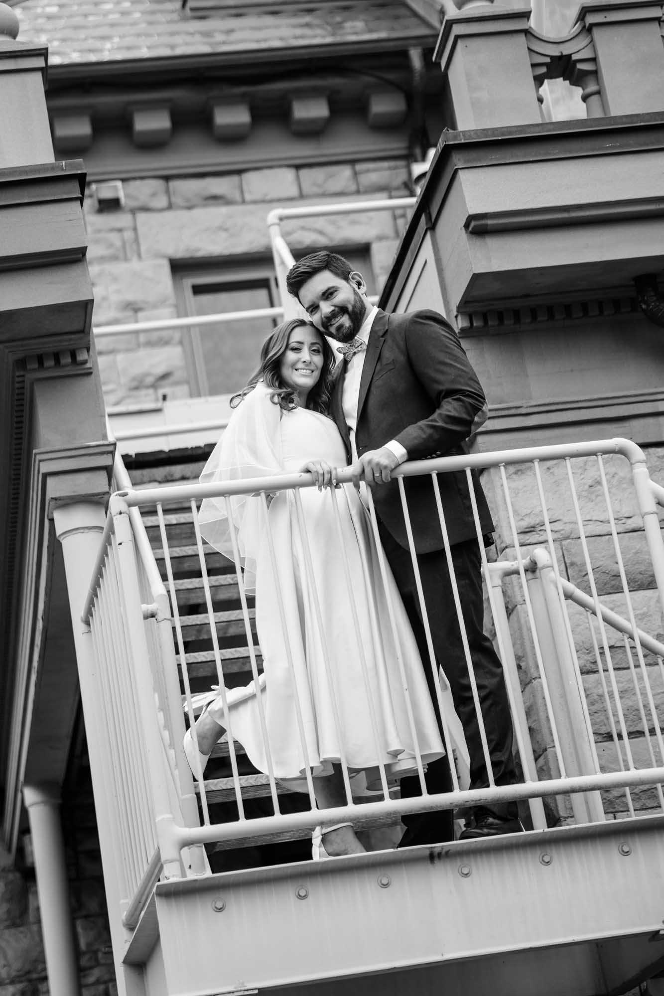 Calgary wedding photographer, couple on their wedding day at Lougheed House, photography in an editorial style with vintage bridal attire and venue
