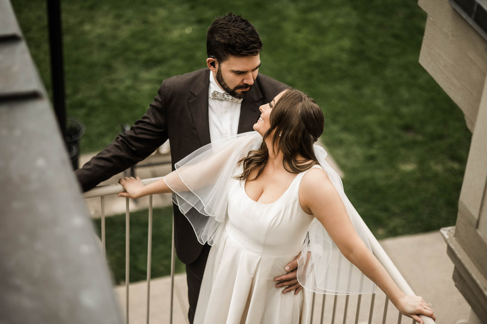 Calgary wedding photographer, couple on their wedding day at Lougheed House, photography in an editorial style with vintage bridal attire and venue
