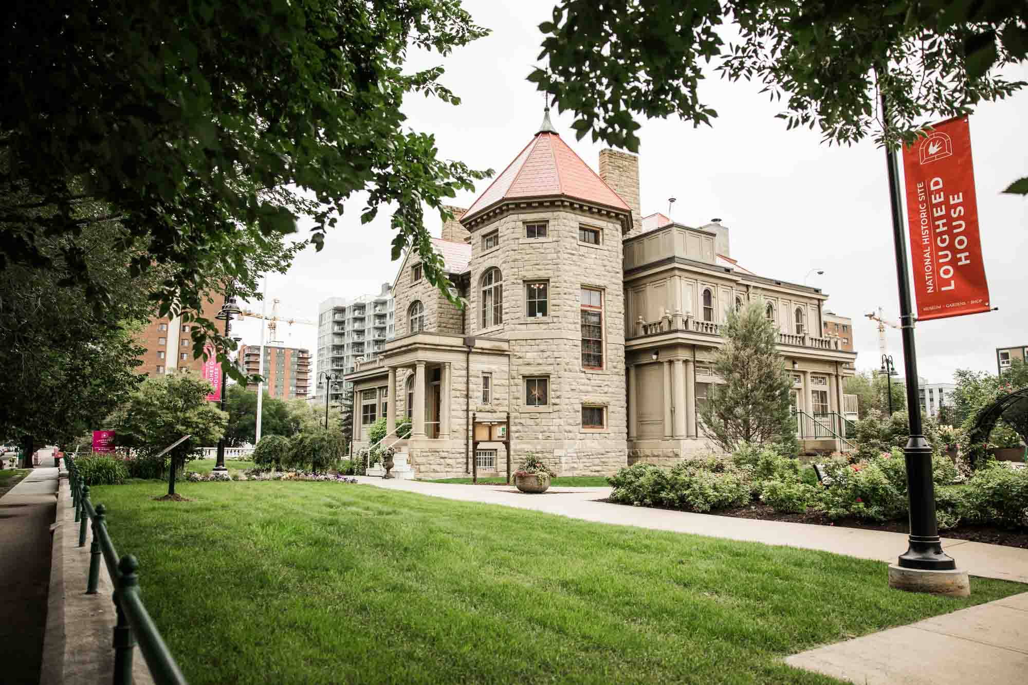Calgary wedding photographer, couple on their wedding day at Lougheed House, photography in an editorial style with vintage bridal attire and venue