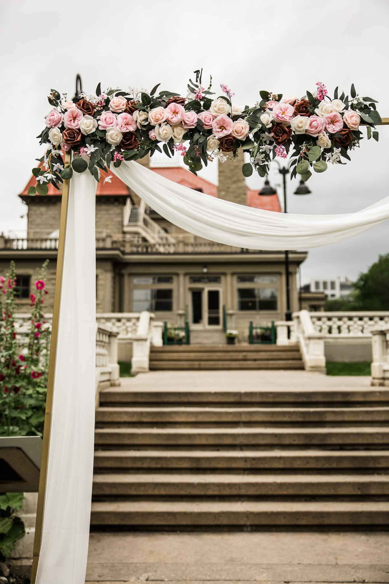 Calgary wedding photographer, couple on their wedding day at Lougheed House, photography in an editorial style with vintage bridal attire and venue