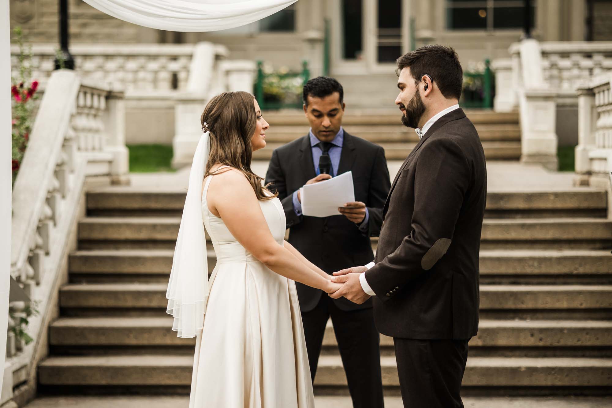 Calgary wedding photographer, couple on their wedding day at Lougheed House, photography in an editorial style with vintage bridal attire and venue