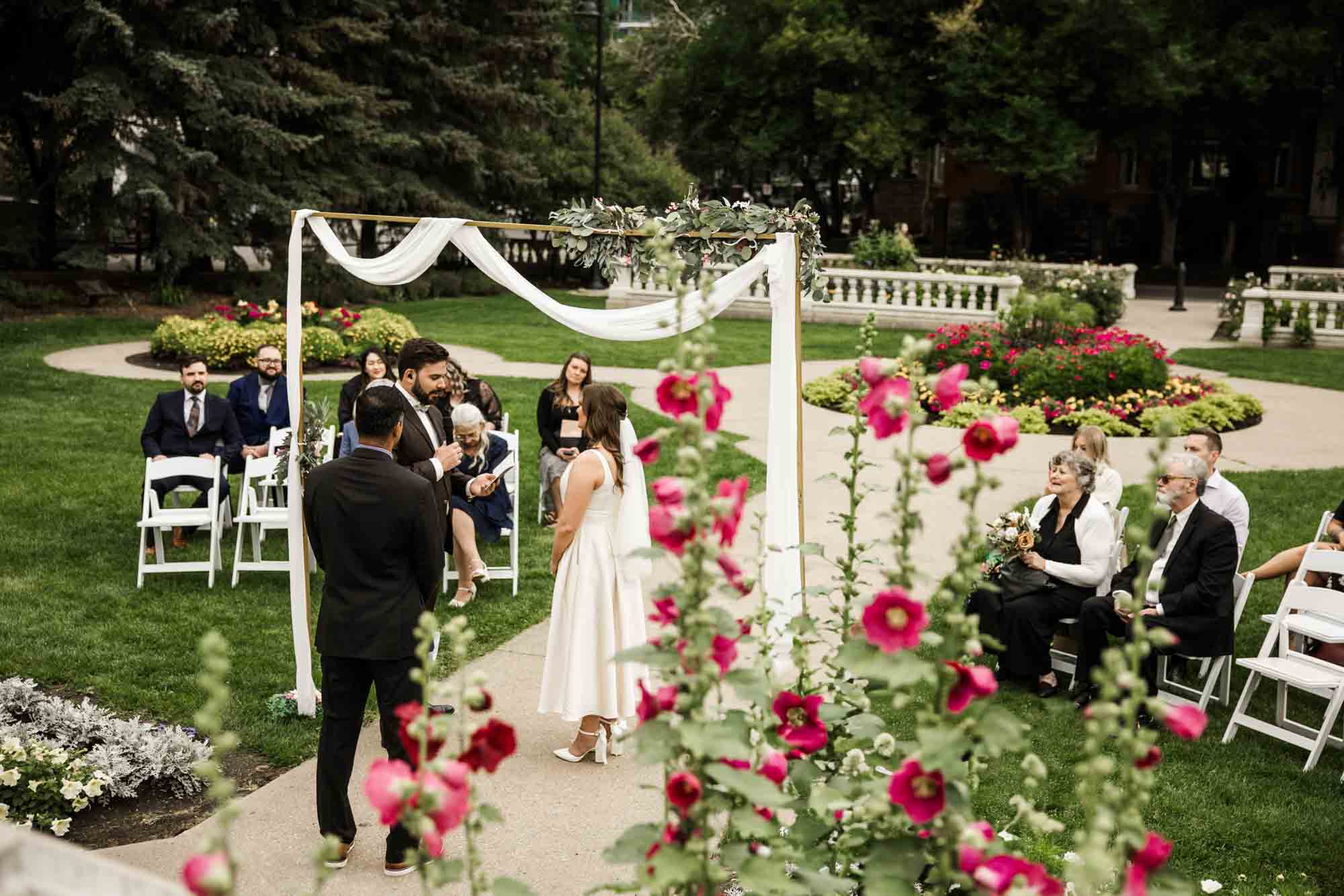 Calgary wedding photographer, couple on their wedding day at Lougheed House, photography in an editorial style with vintage bridal attire and venue