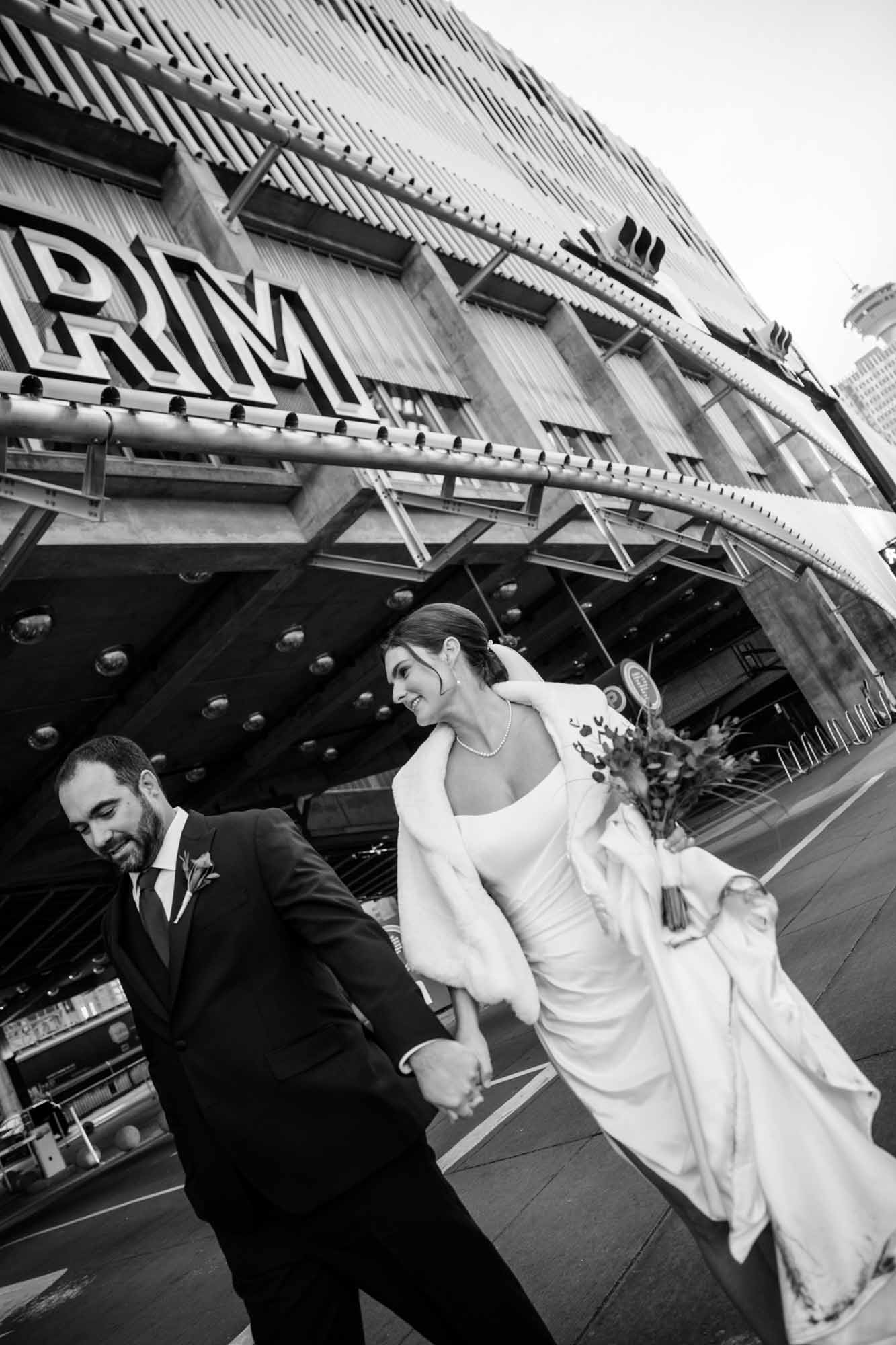 Calgary wedding photographer, bride and groom on their wedding day at the Central Library, candid, documentary, storytelling photography