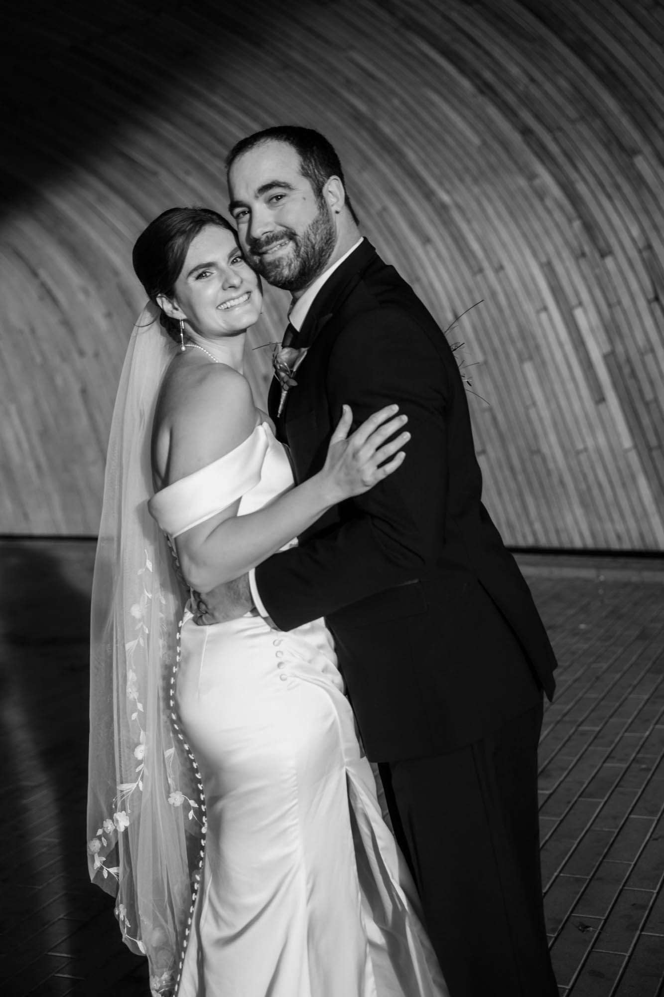 Calgary wedding photographer, bride and groom on their wedding day at the Central Library, candid, documentary, storytelling photography